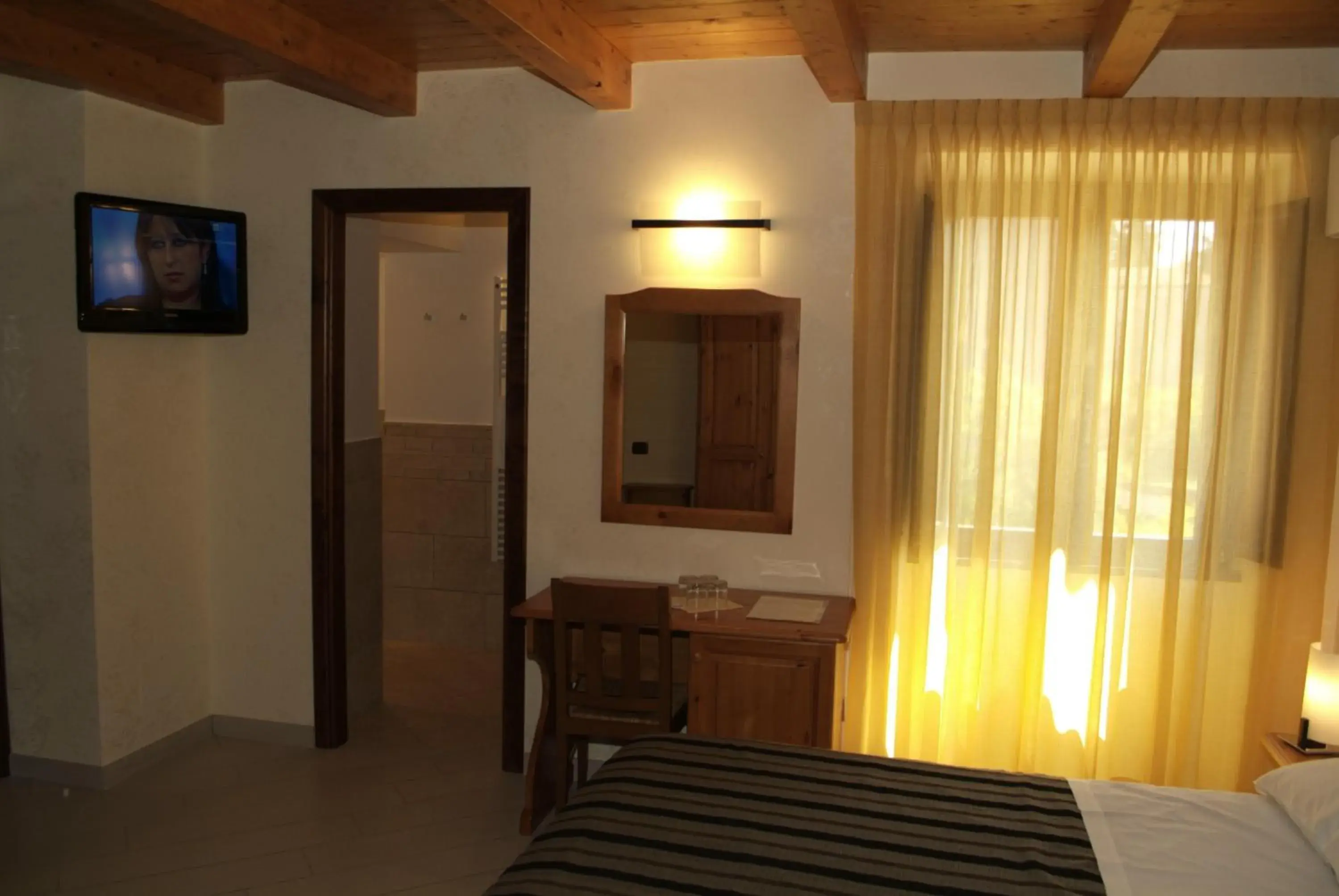 Photo of the whole room, TV/Entertainment Center in Locanda Dal Sor Francesco