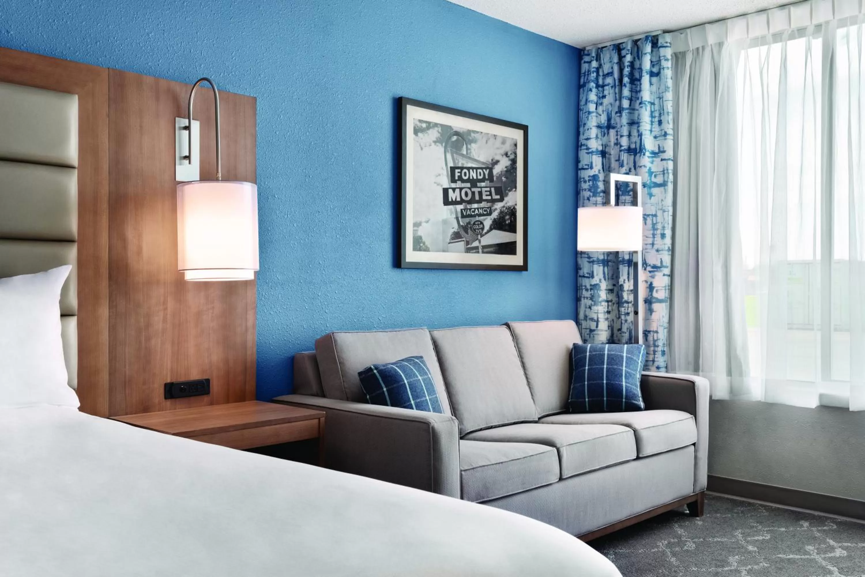 Seating area, Bed in Radisson Hotel and Conference Center Fond du Lac