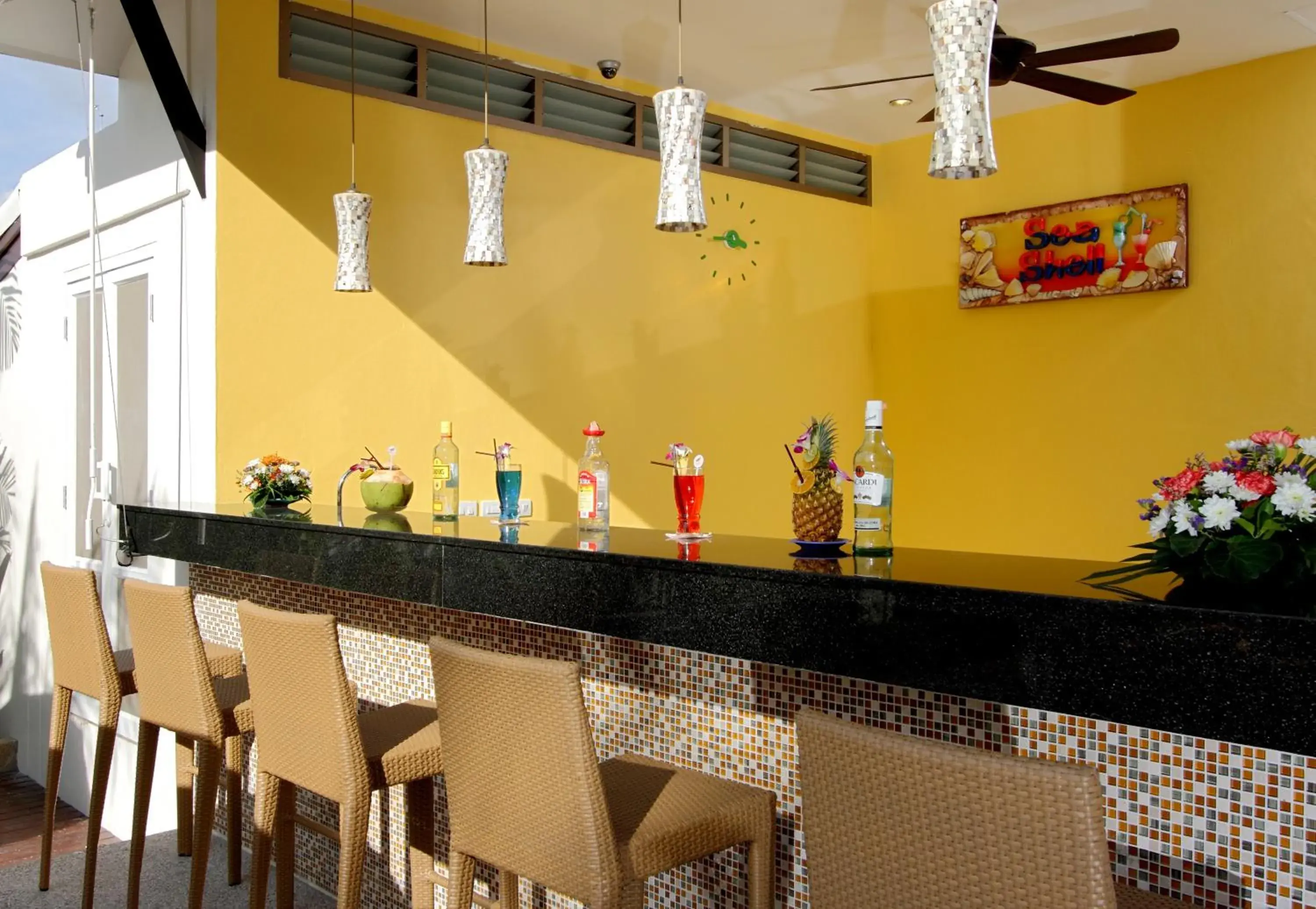 Lounge or bar in Kata Sea Breeze Resort - SHA Plus Lounge or bar in Kata Sea Breeze Resort - SHA Plus