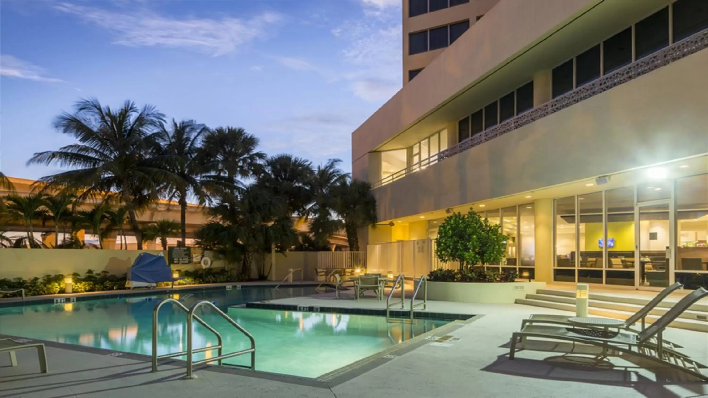 Swimming Pool in Holiday Inn Palm Beach-Airport Conf Ctr, an IHG Hotel