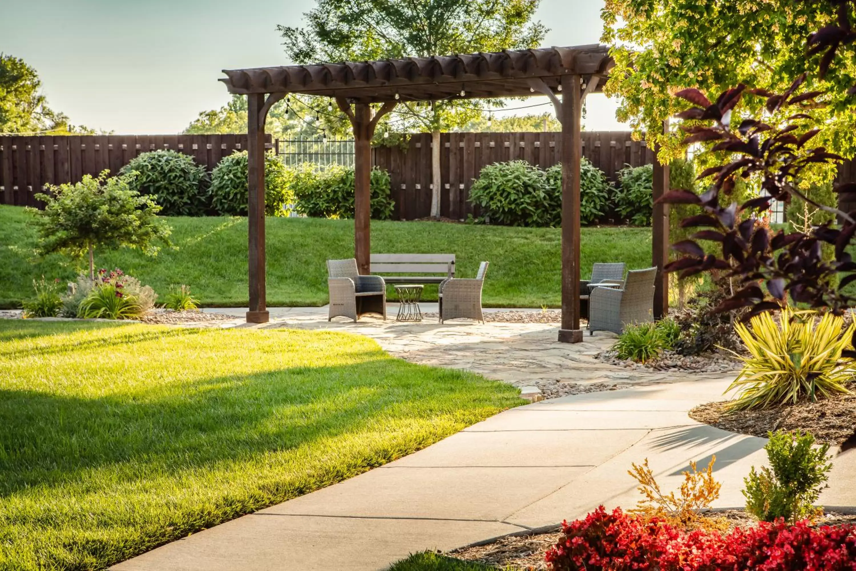 Patio, Garden in Holiday Inn Wichita East I-35, an IHG Hotel