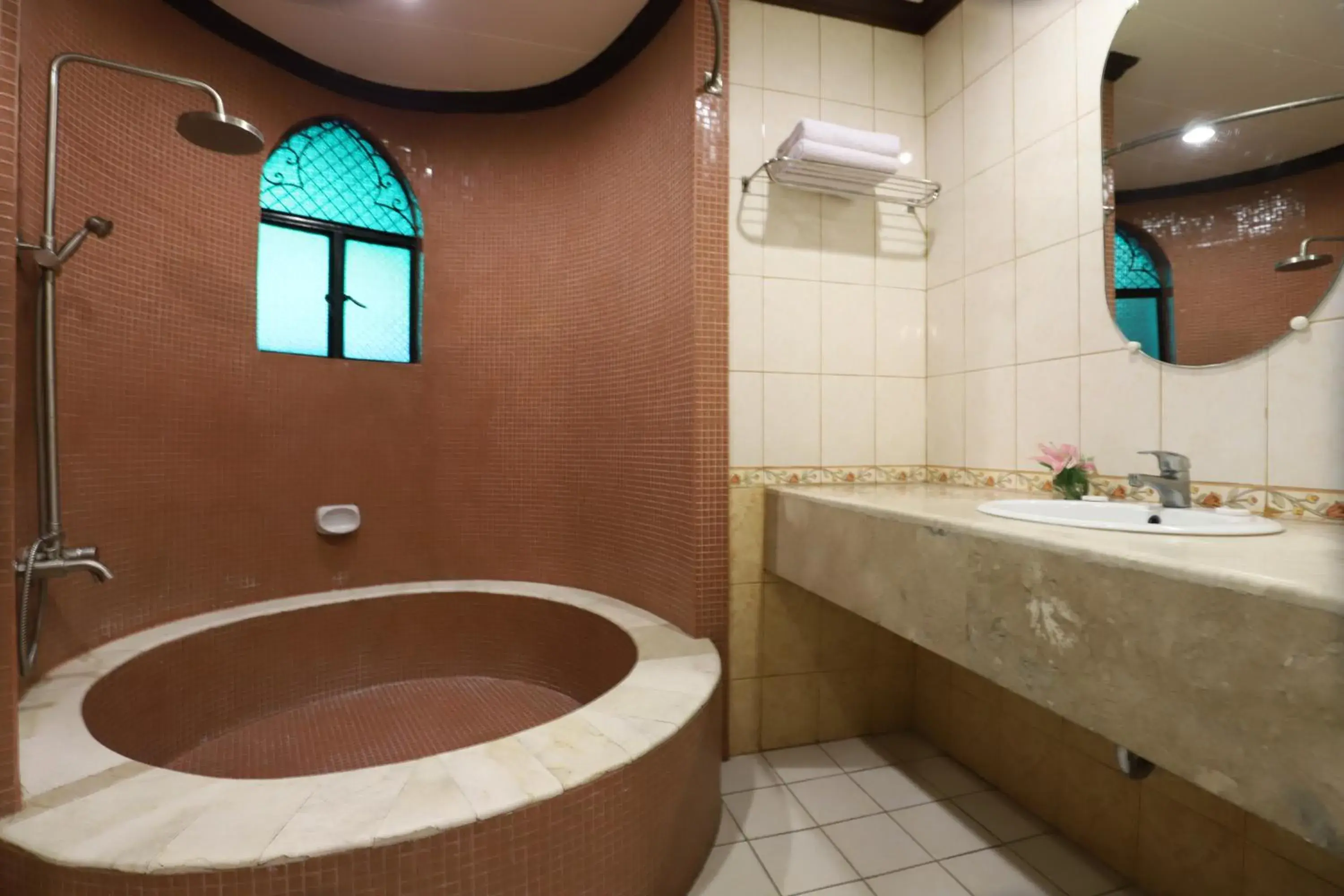 Bathroom in The New Camelot Hotel