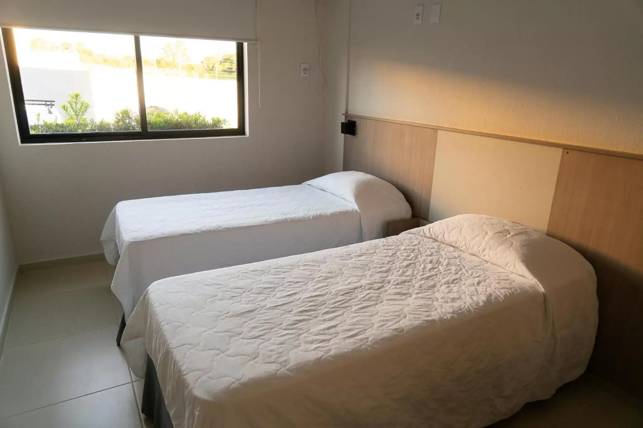 Bed in Iguassu Express Hotel