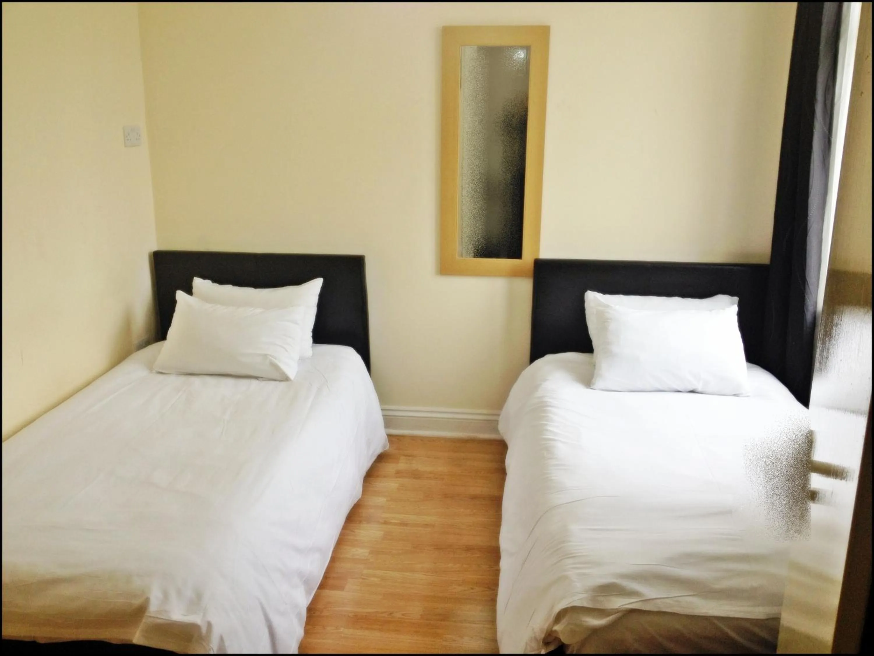 Photo of the whole room, Bed in City View Hotel - Roman Road Market