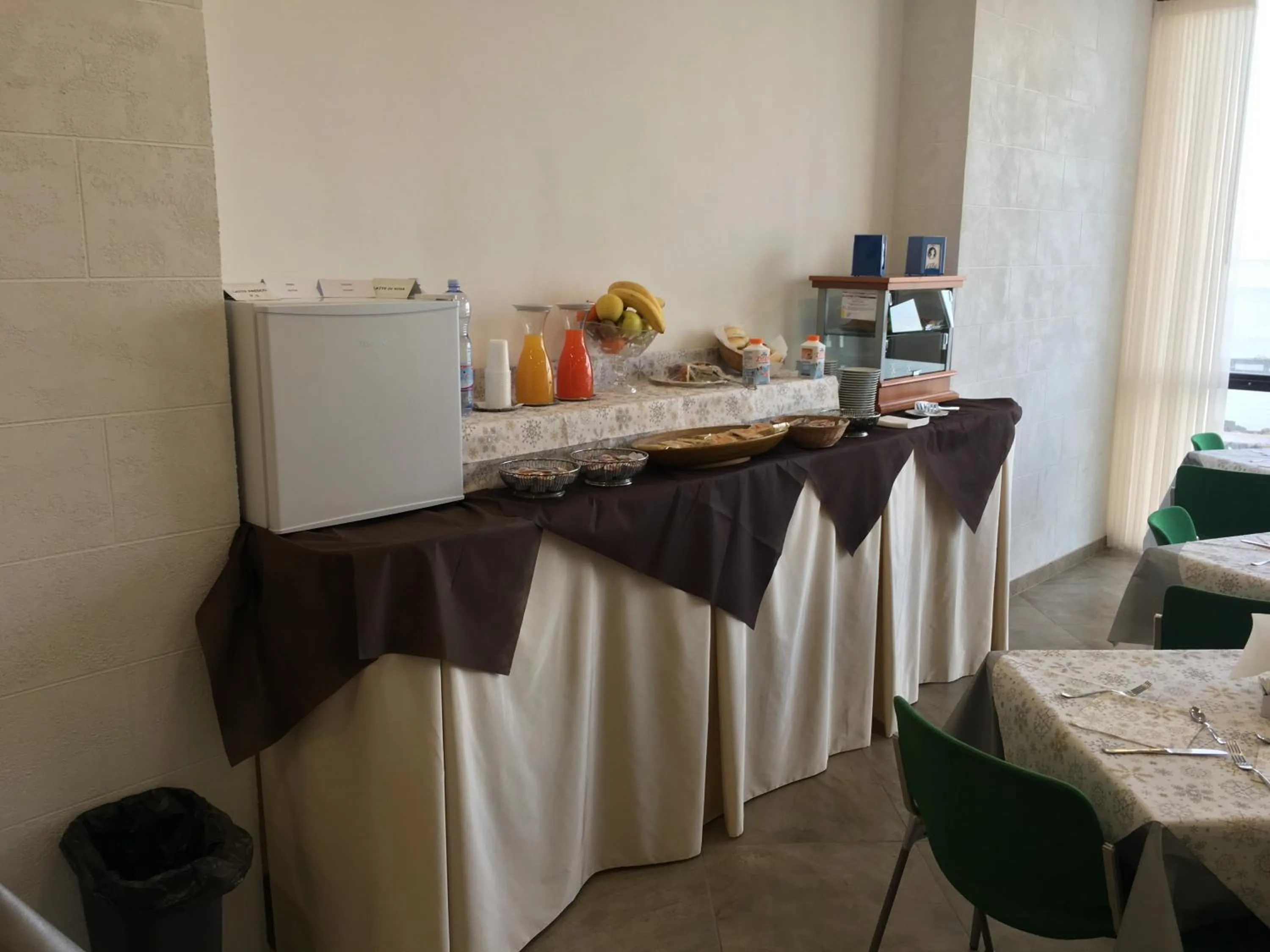 Communal lounge/ TV room in Hotel Virgilio