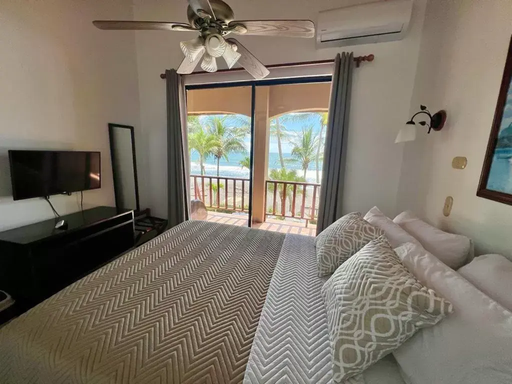 Balcony/Terrace, Bed in The Backyard Beachfront Hotel