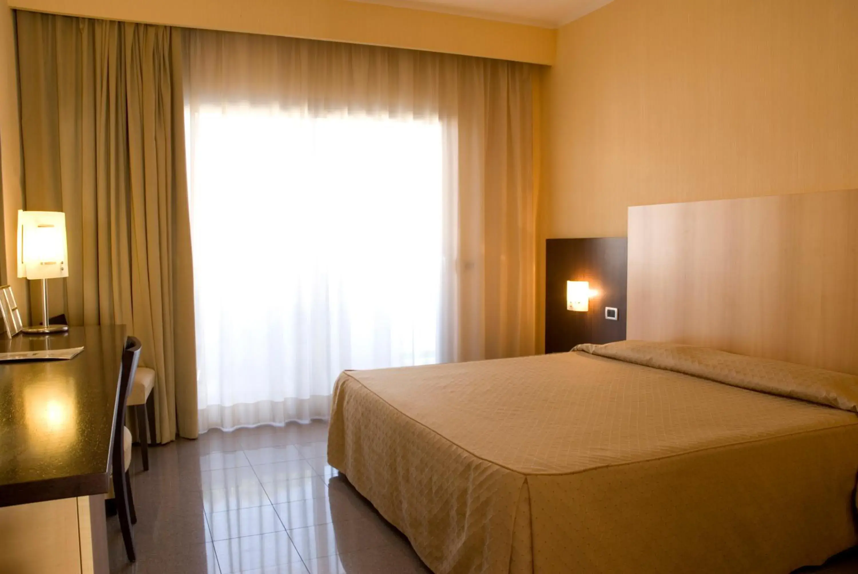 Bed in Albergo Mediterraneo