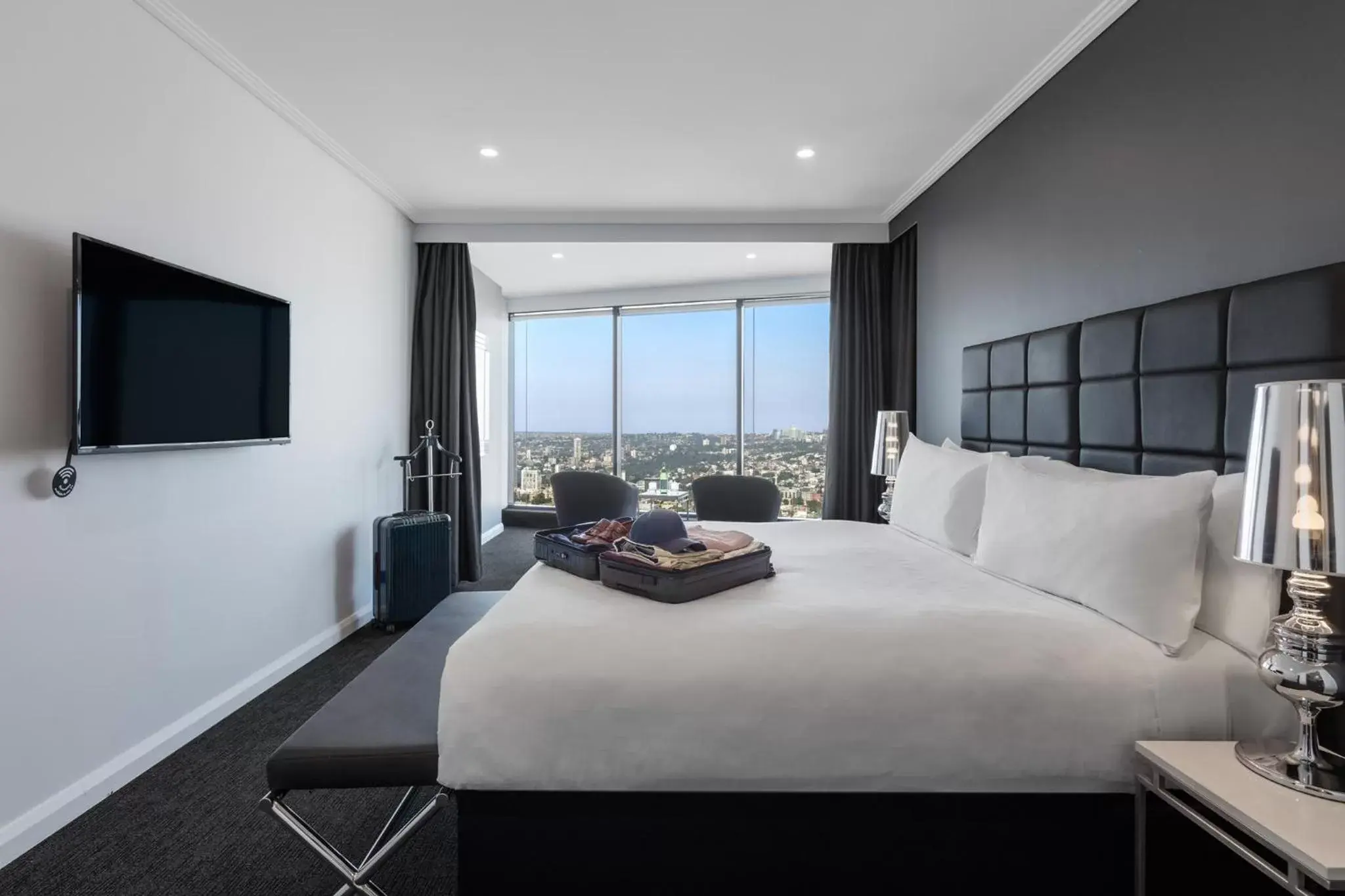 Bed in Meriton Suites World Tower, Sydney