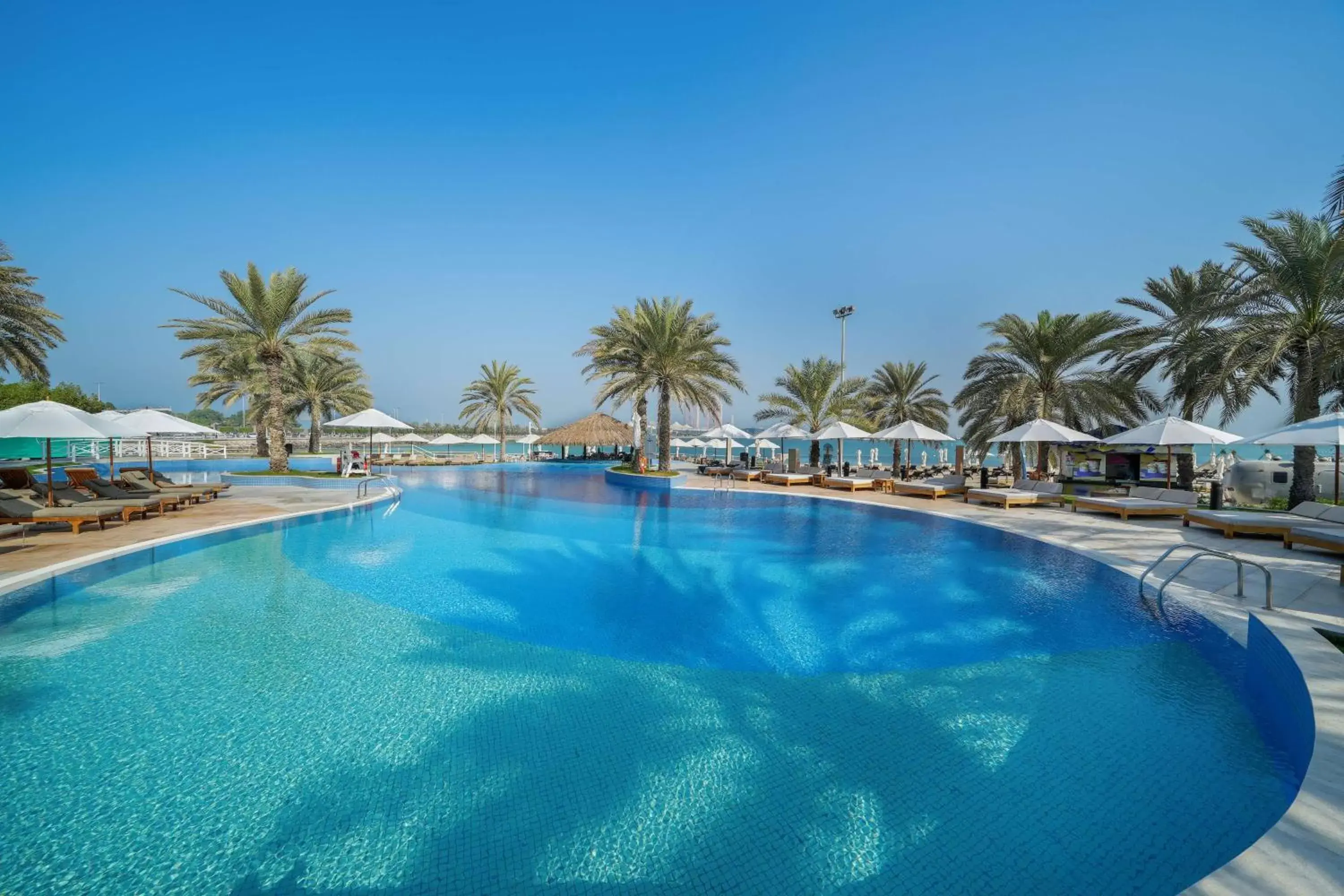 Pool view, Swimming Pool in Radisson Blu Hotel & Resort, Abu Dhabi Corniche