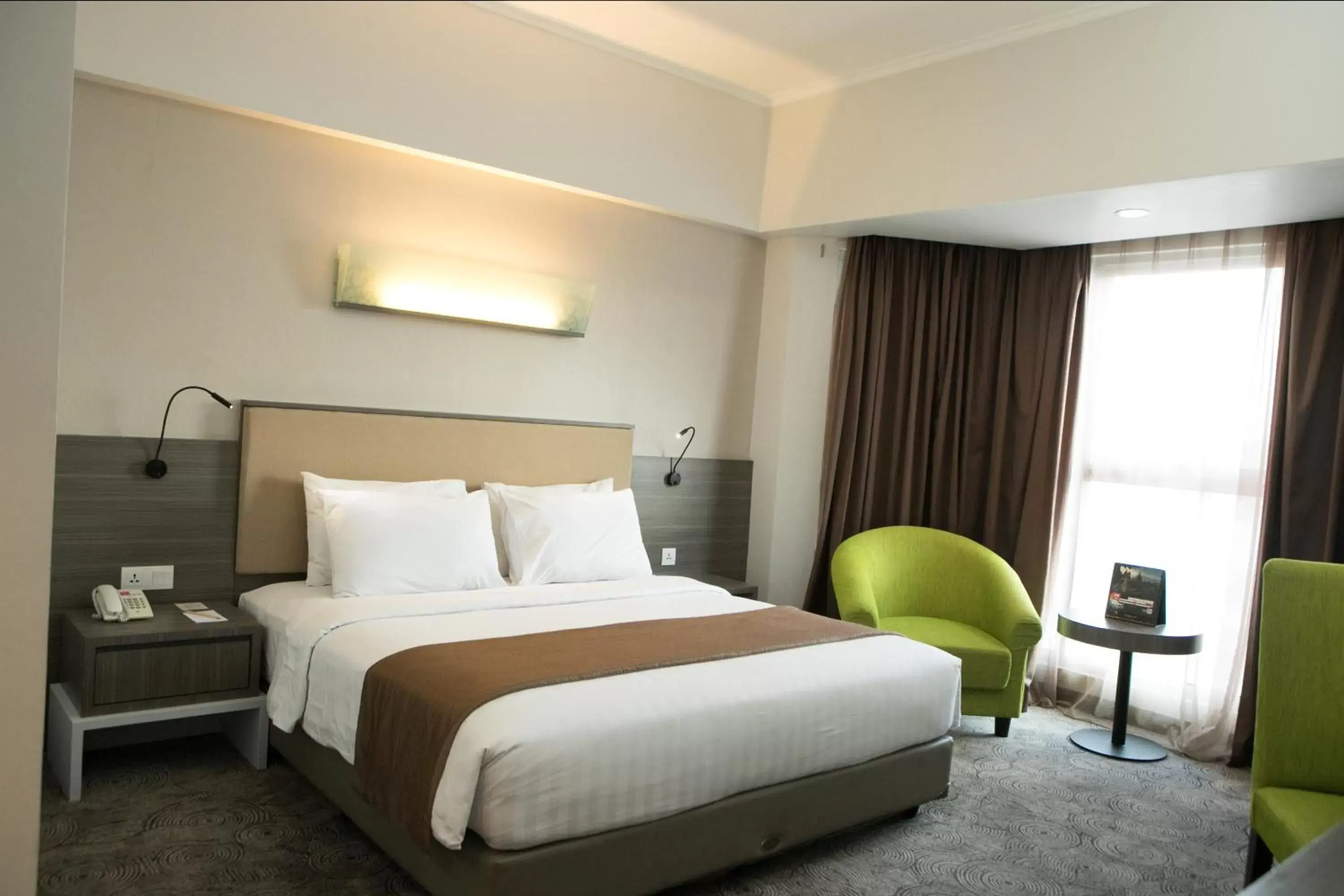 Bed in Swiss-Belhotel Borneo Samarinda