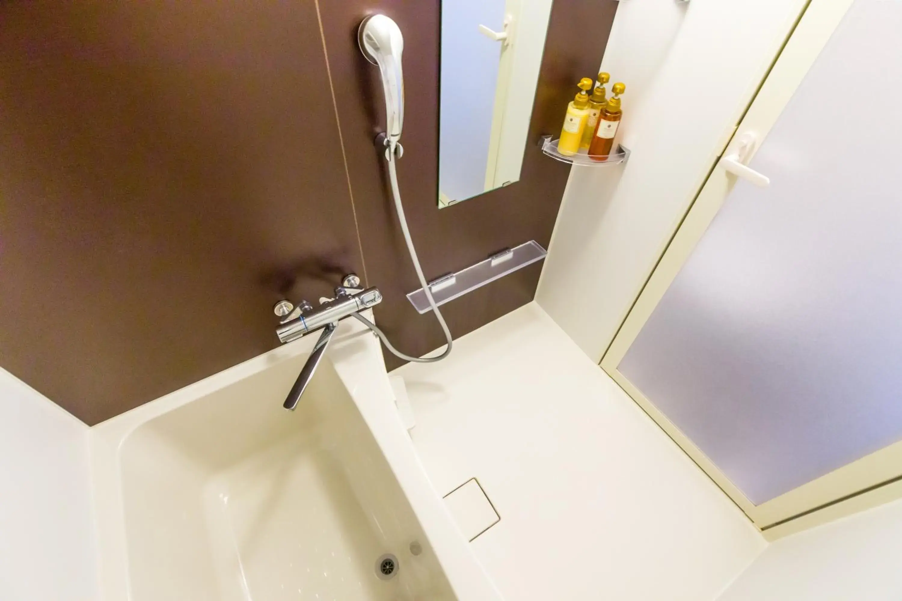 Shower, TV/Entertainment Center in Mr. Kinjo in AirPort