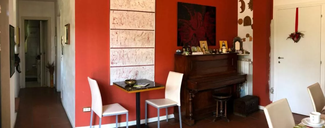 Communal lounge/ TV room in B&B Via Roma