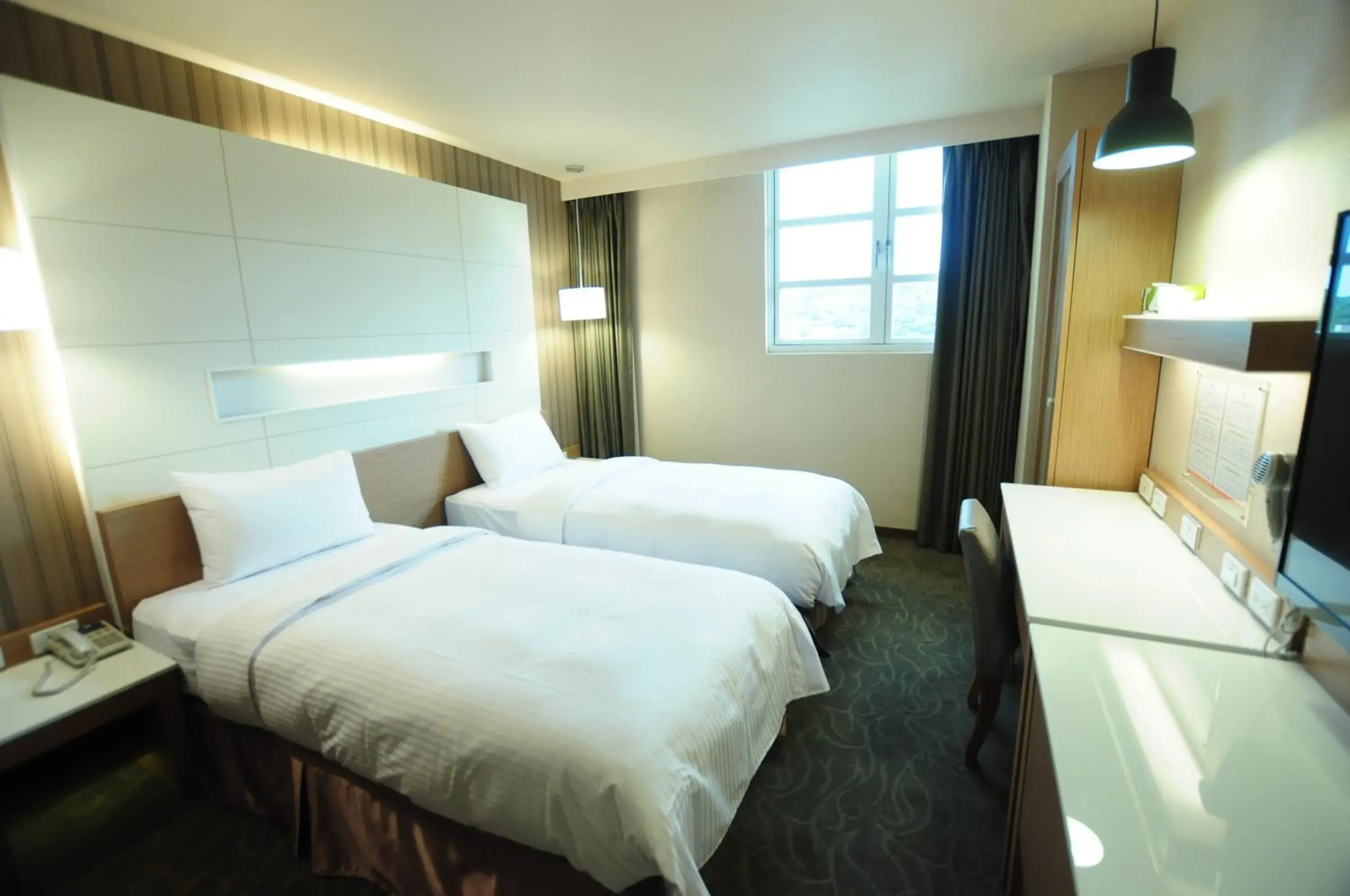 Bed in Kindness Hotel Hualien
