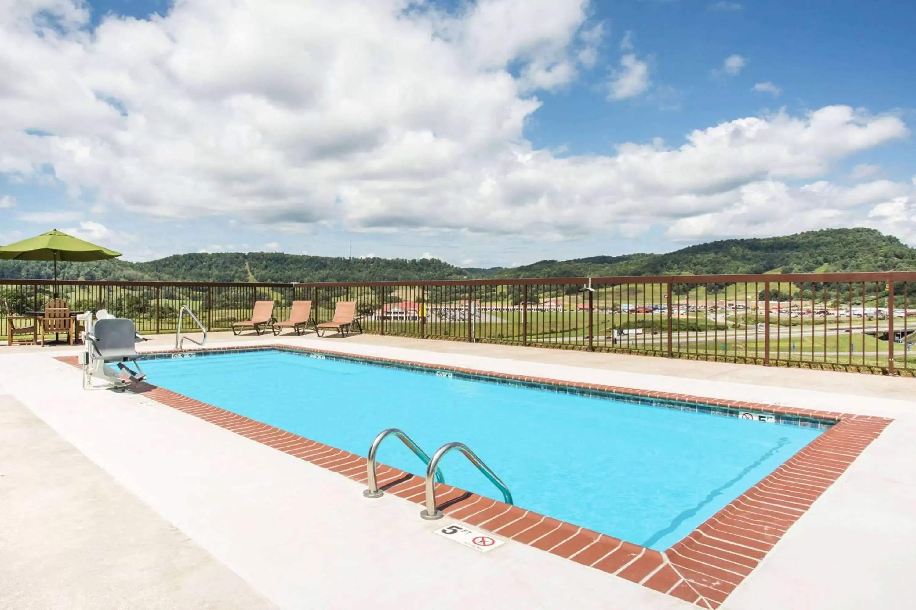 Activities, Swimming Pool in Days Inn & Suites by Wyndham Sutton Flatwoods