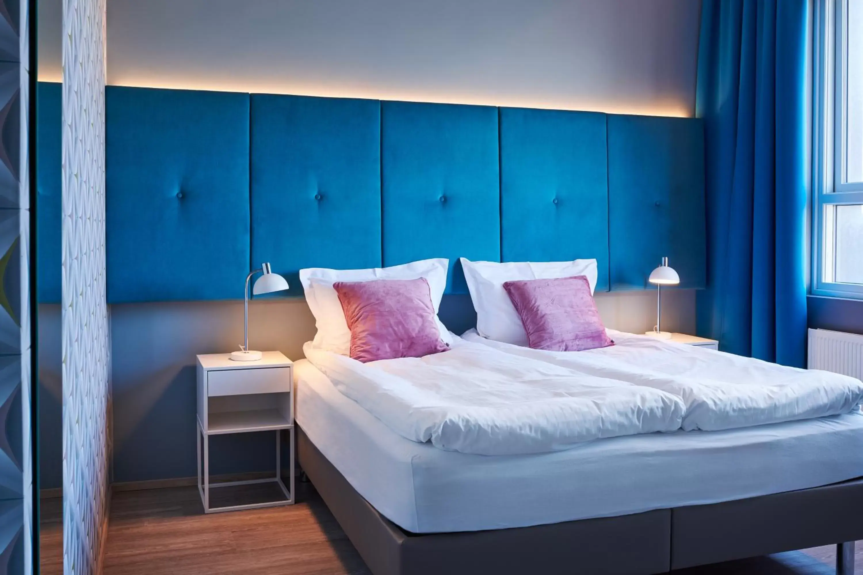 Bed in ODDSSON Hotel