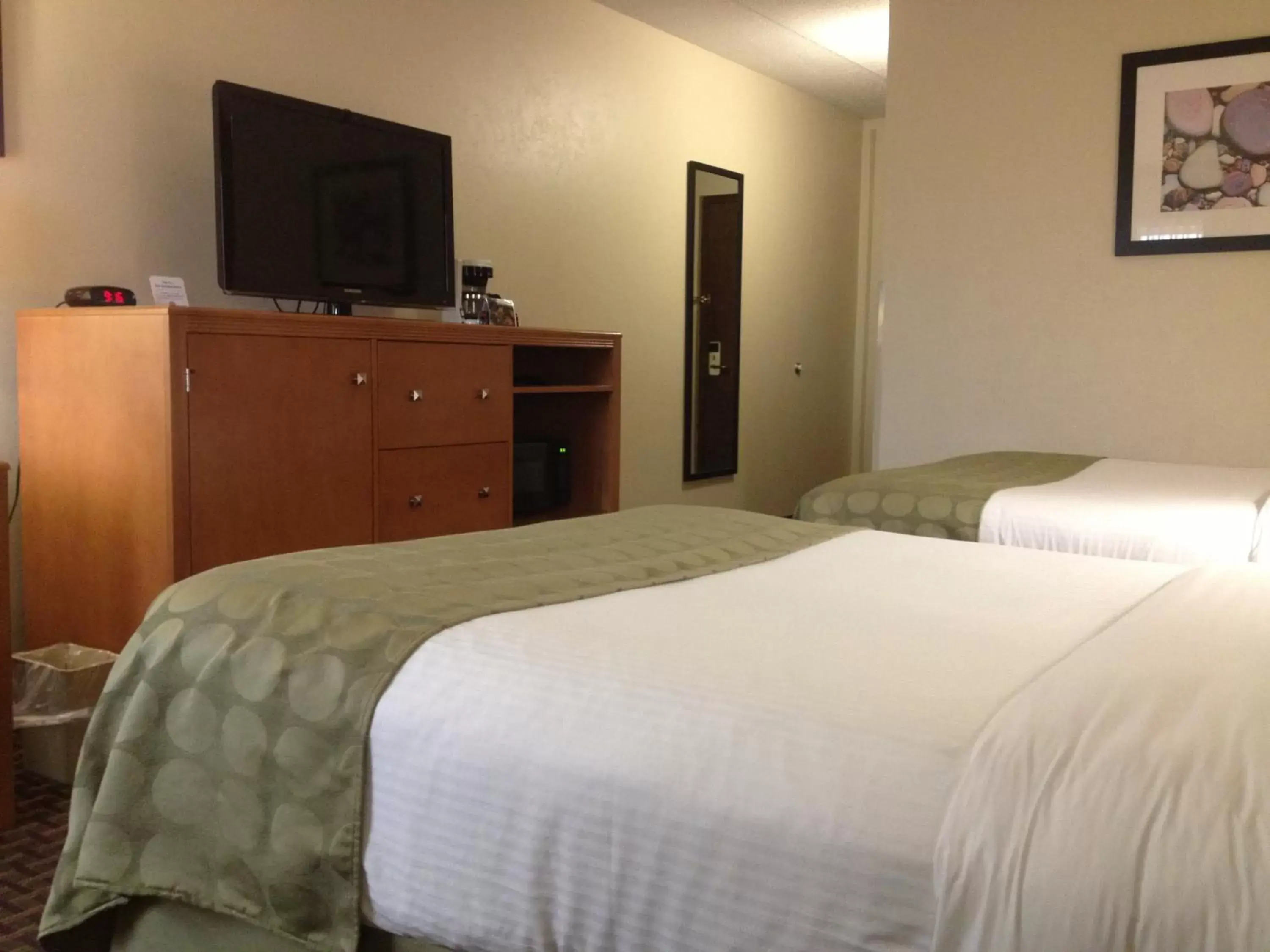 Bed in Ramada by Wyndham Marquette