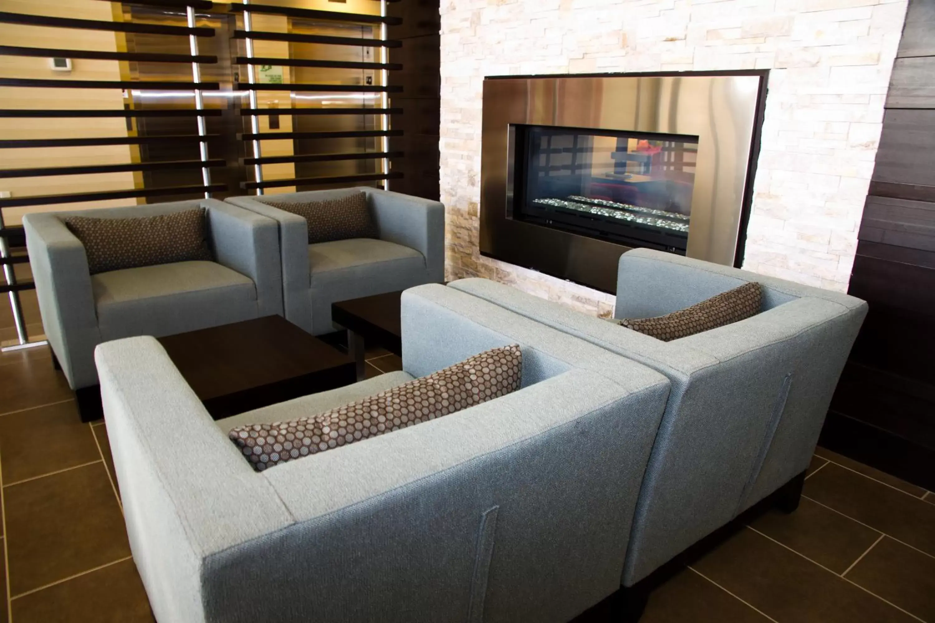 Lobby or reception, Seating Area in Holiday Inn Hotel & Suites Red Deer, an IHG Hotel