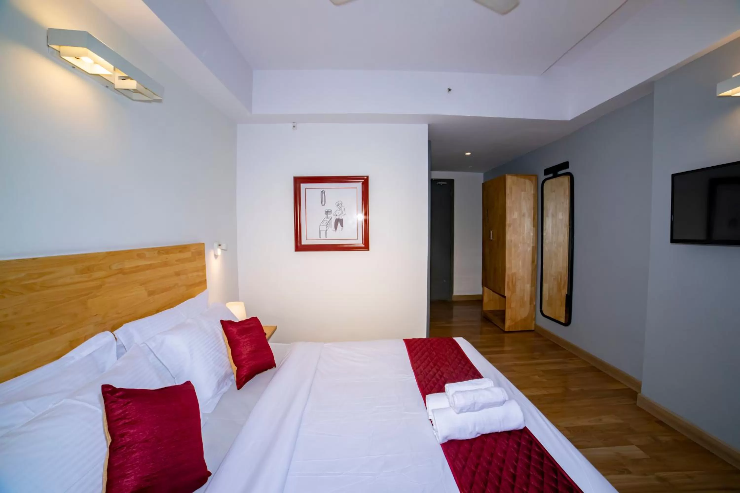 wardrobe, Bed in The Urban Stays