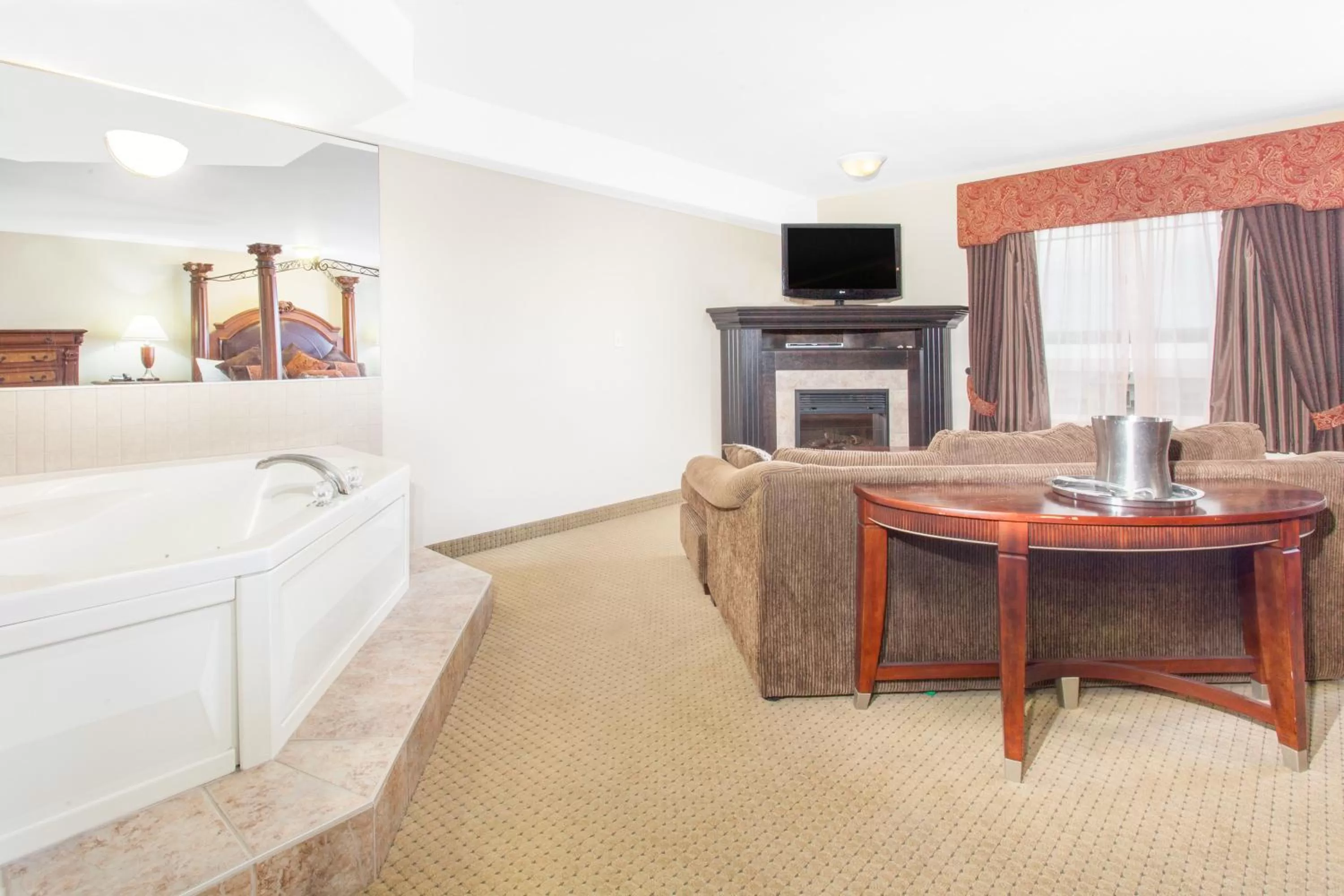 Seating area in Ramada by Wyndham Pincher Creek