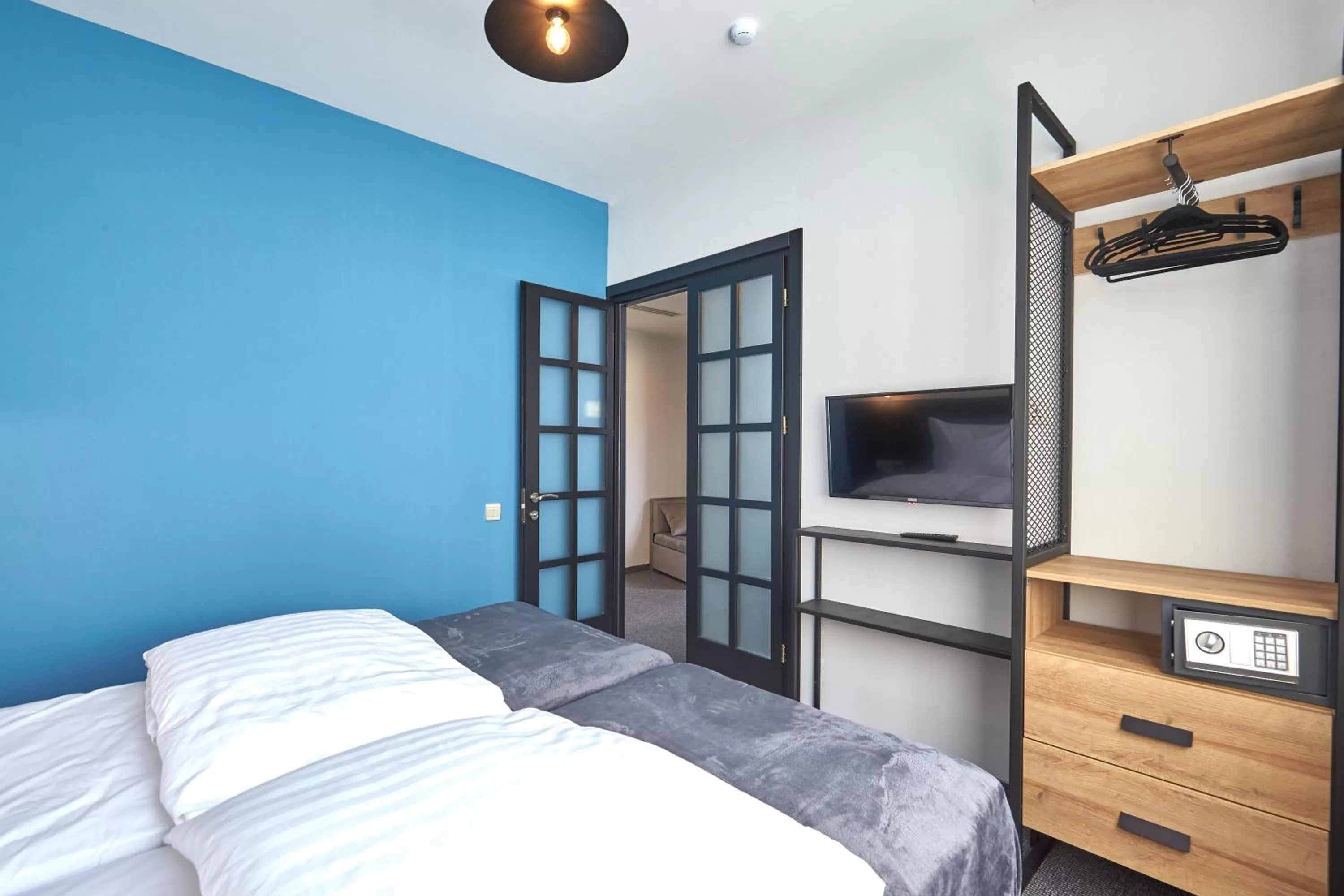 TV and multimedia, Bed in Graphica Tbilisi Hotel