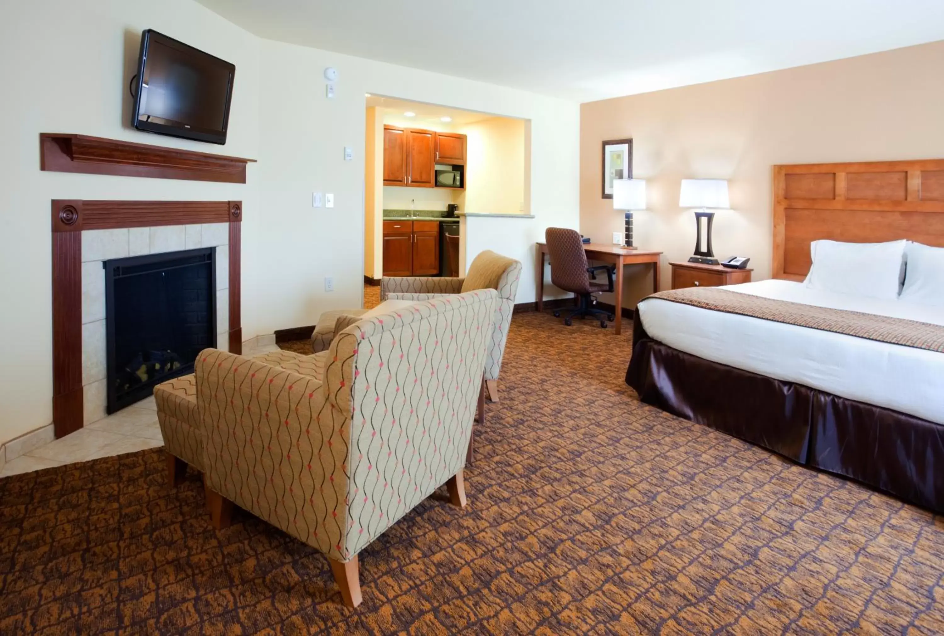 Photo of the whole room, TV/Entertainment Center in Holiday Inn Express Hotel & Suites Mount Airy, an IHG Hotel