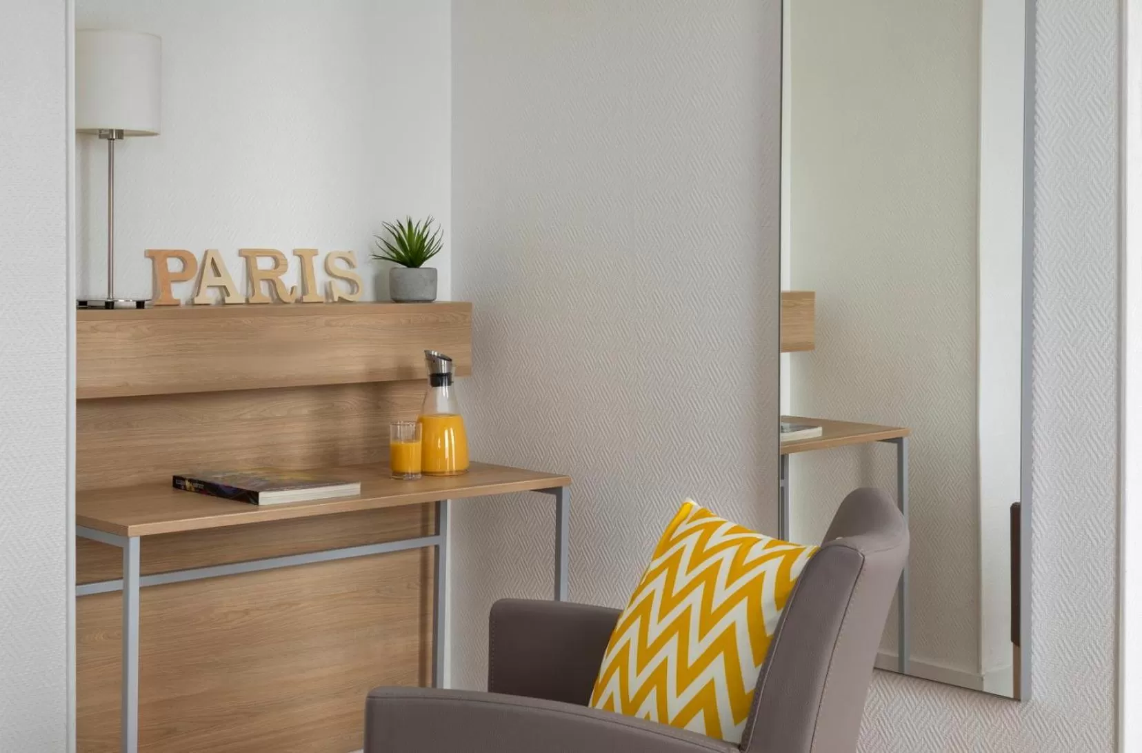 Seating area in Citadines Bastille Marais Paris