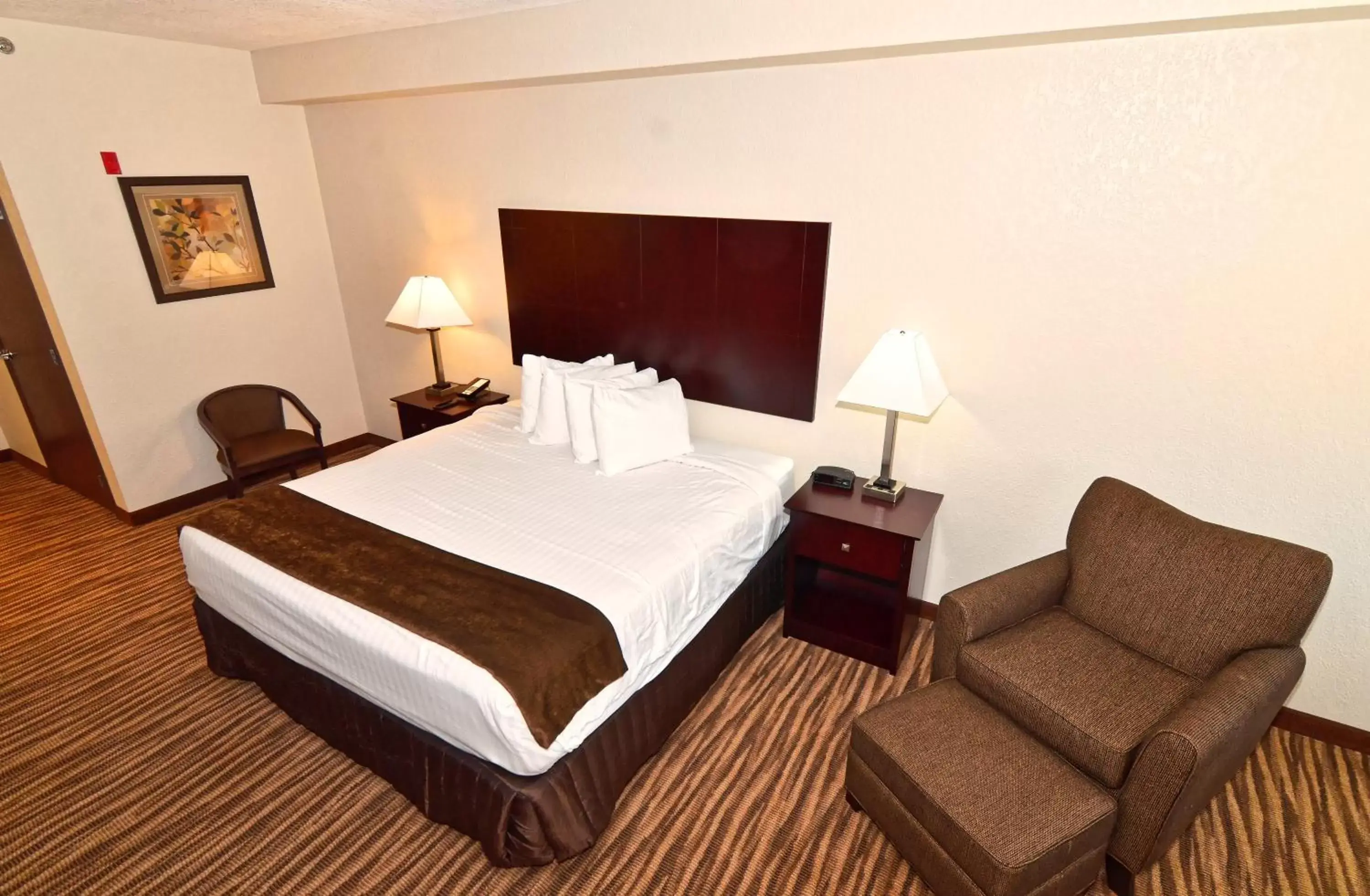 Bed in Cobblestone Inn & Suites - Clarion