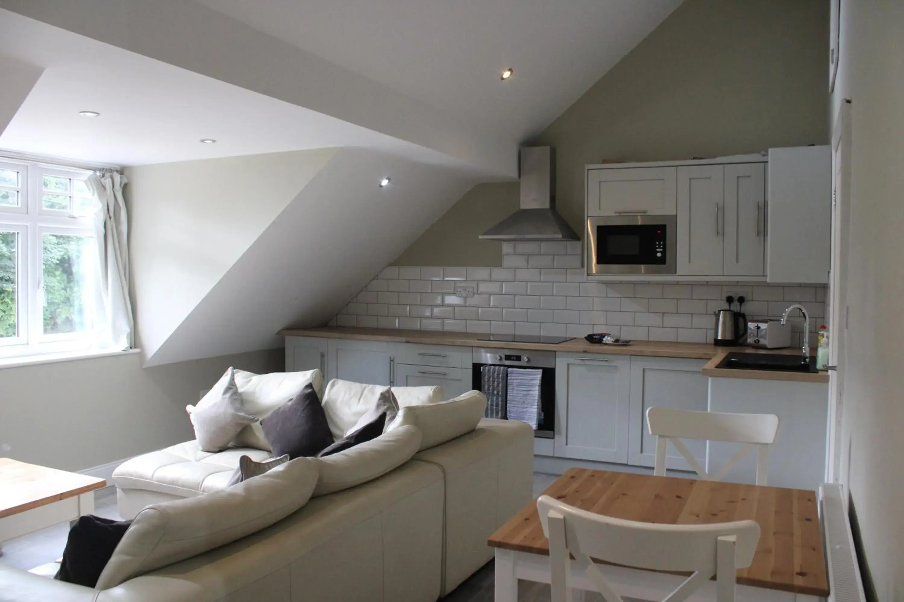 Living room, Seating Area in White House Cottages