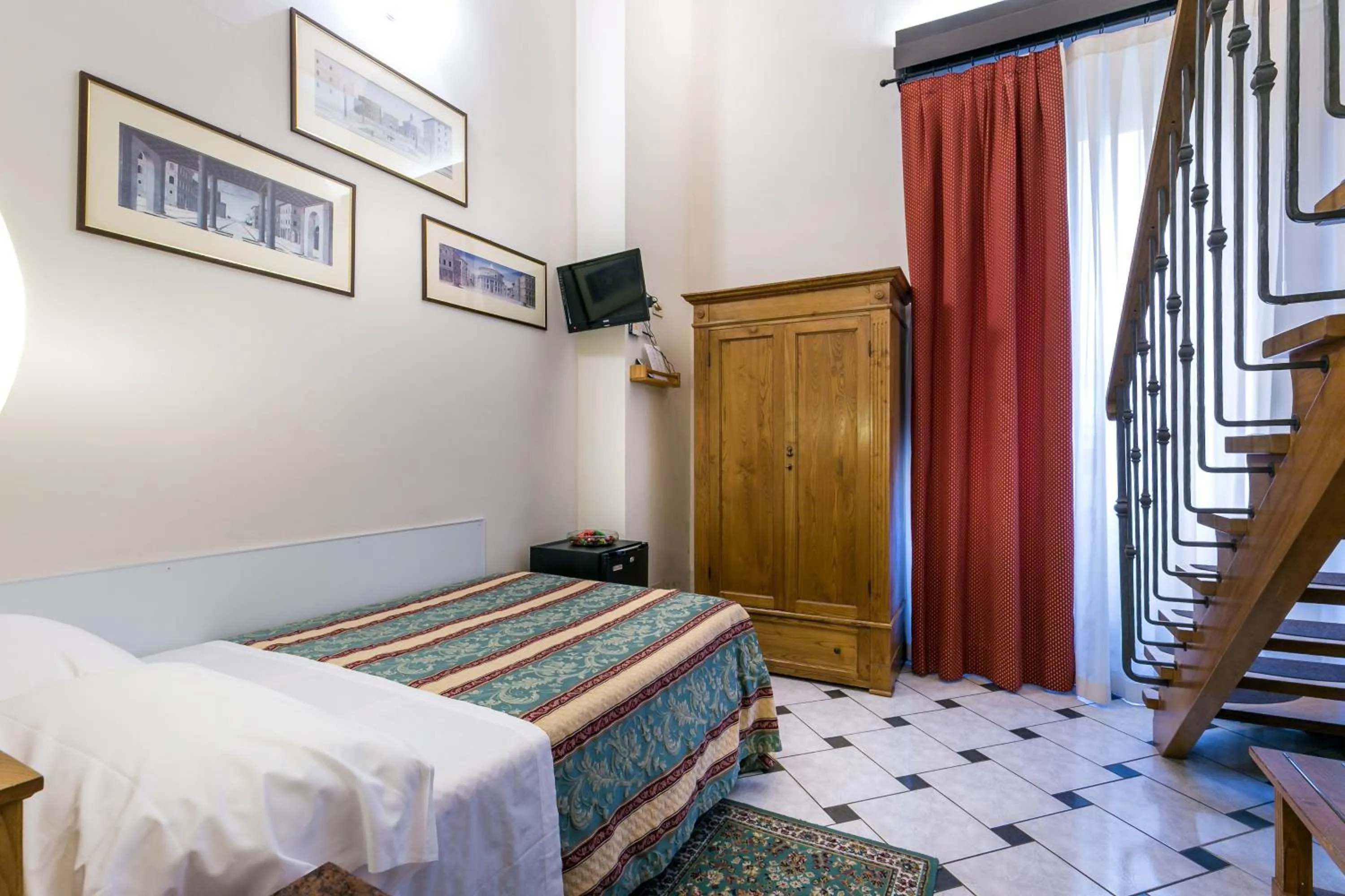 Photo of the whole room, Bed in Hotel Collodi Firenze