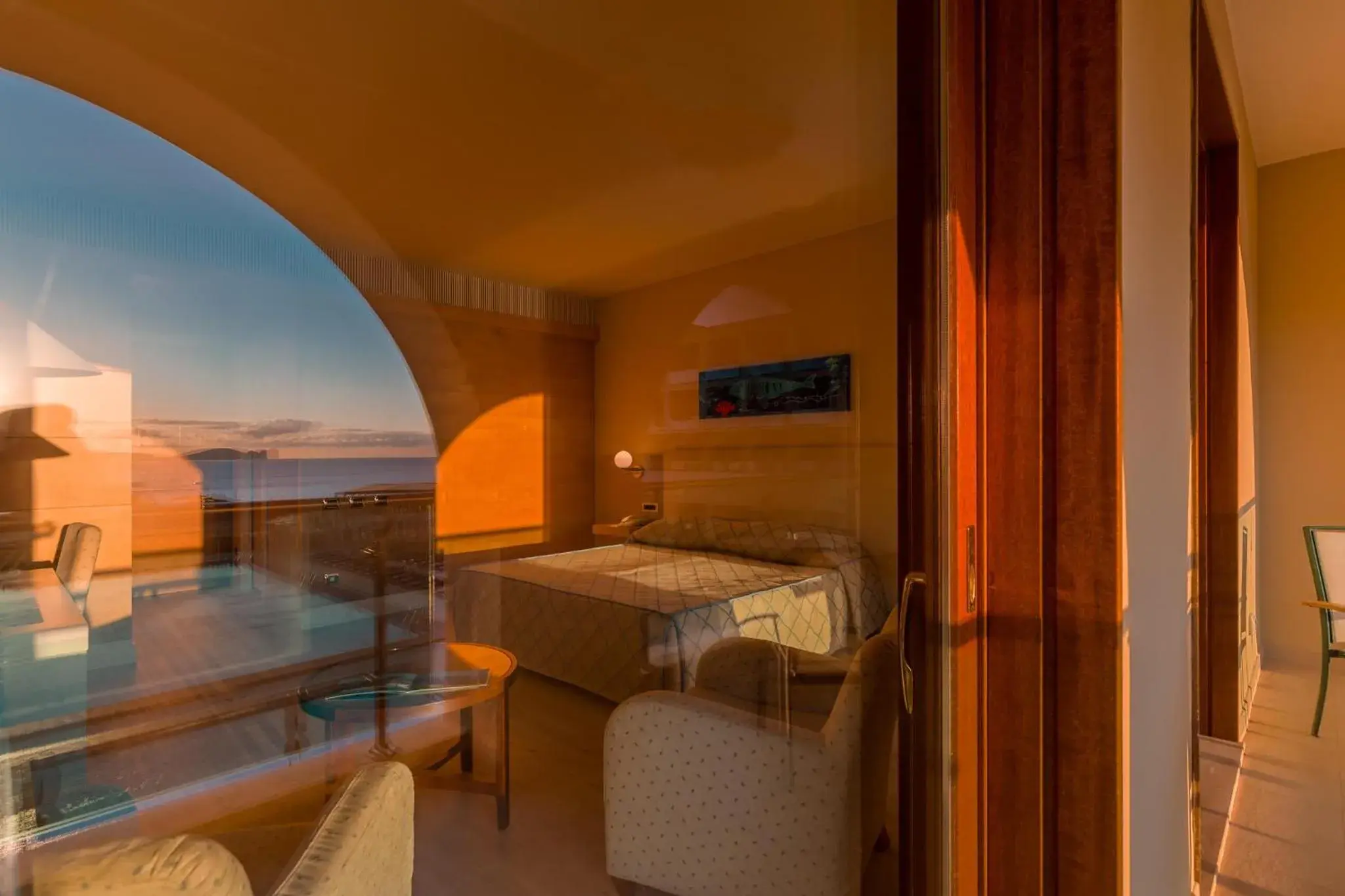 Bedroom in Smy Carlos V Wellness & Spa Alghero Bedroom in Smy Carlos V Wellness & Spa Alghero