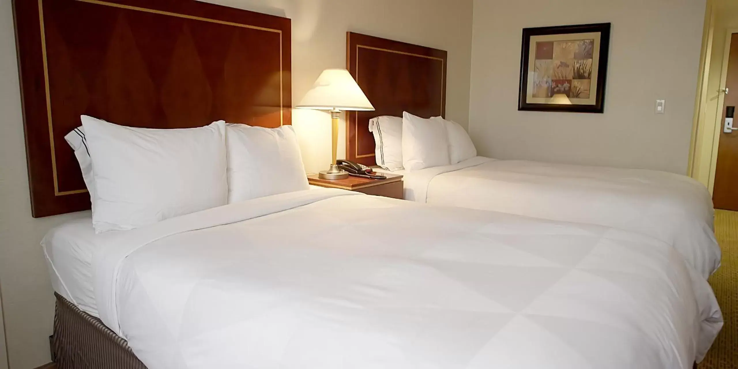 Bed in Hotel Executive Suites