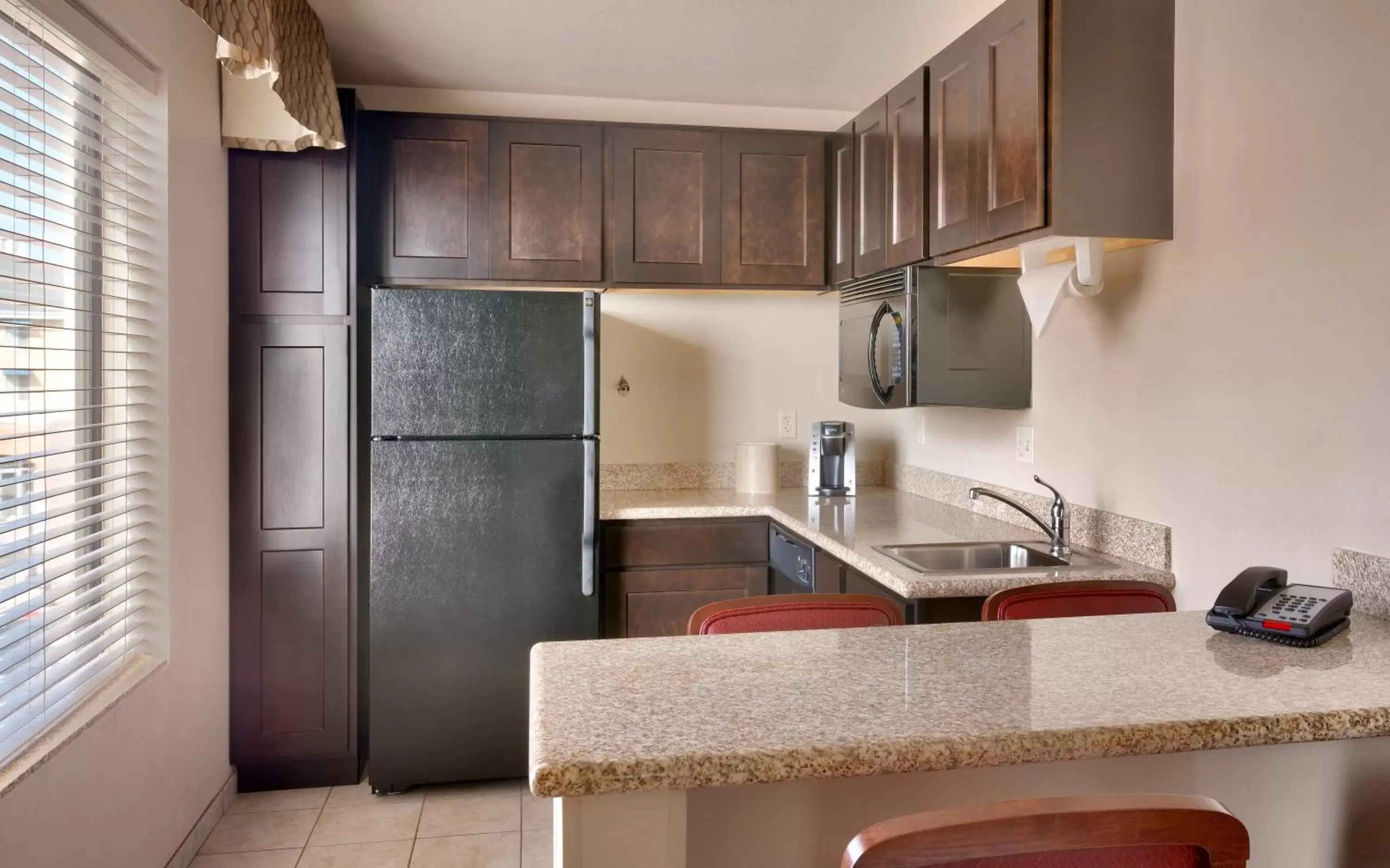 Kitchen/Kitchenette in Holiday Inn Express Orem-North Provo, an IHG Hotel