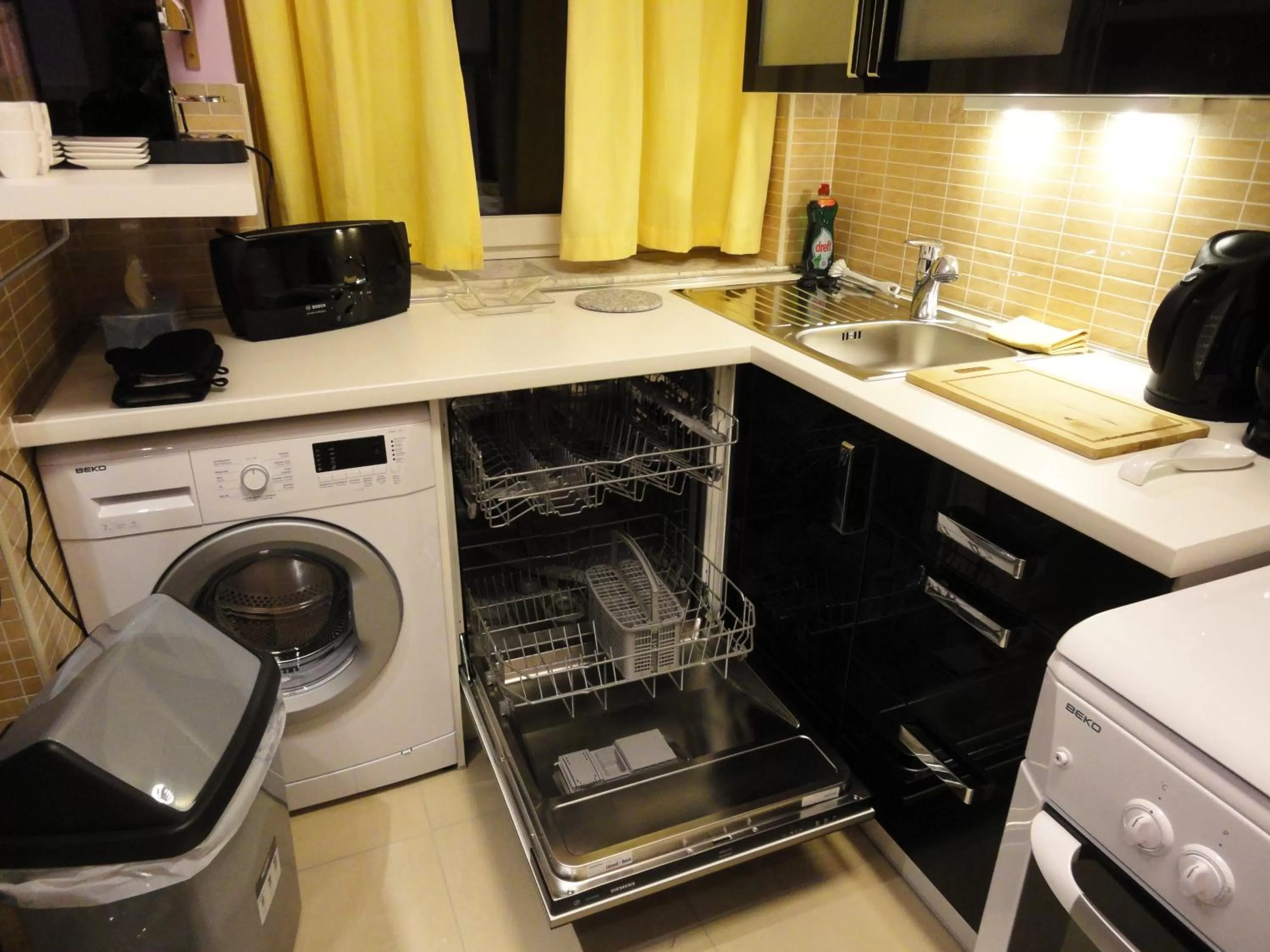 Kitchen or kitchenette in Aparthotel Résidence Bara Midi