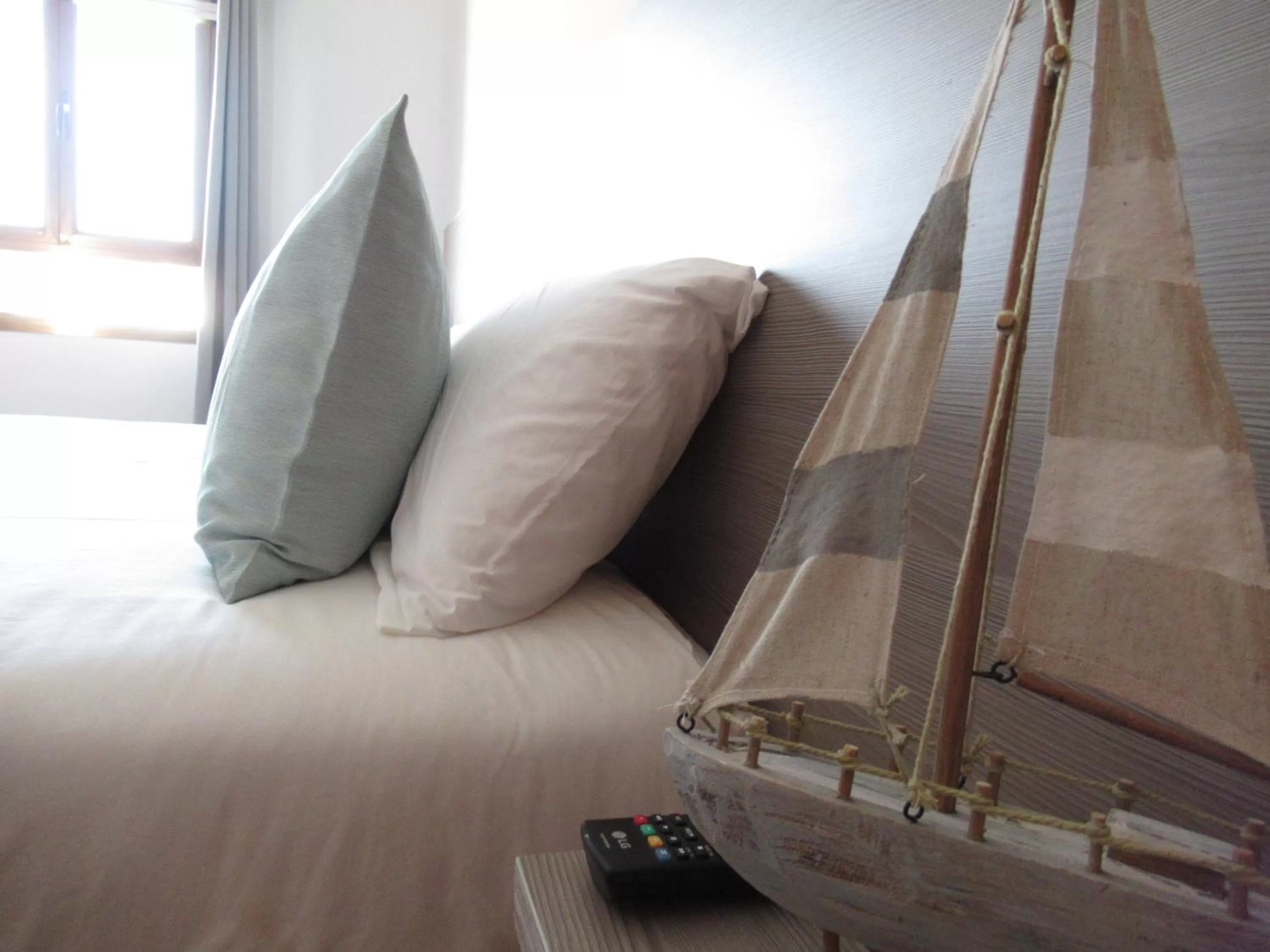 Decorative detail, Bed in NÁUTICO Suites, by Comfortable Luxury - Adults Only