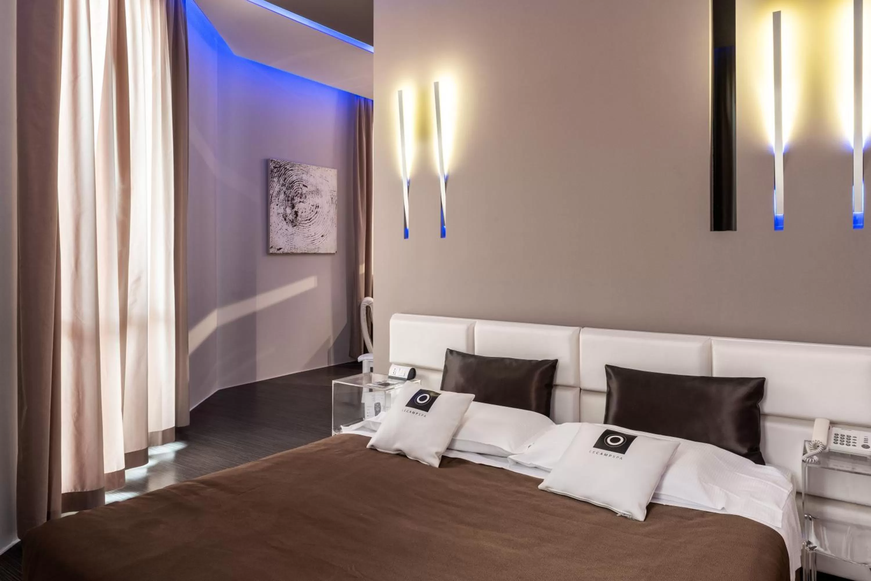 Bed in Le Camp Suite & Spa