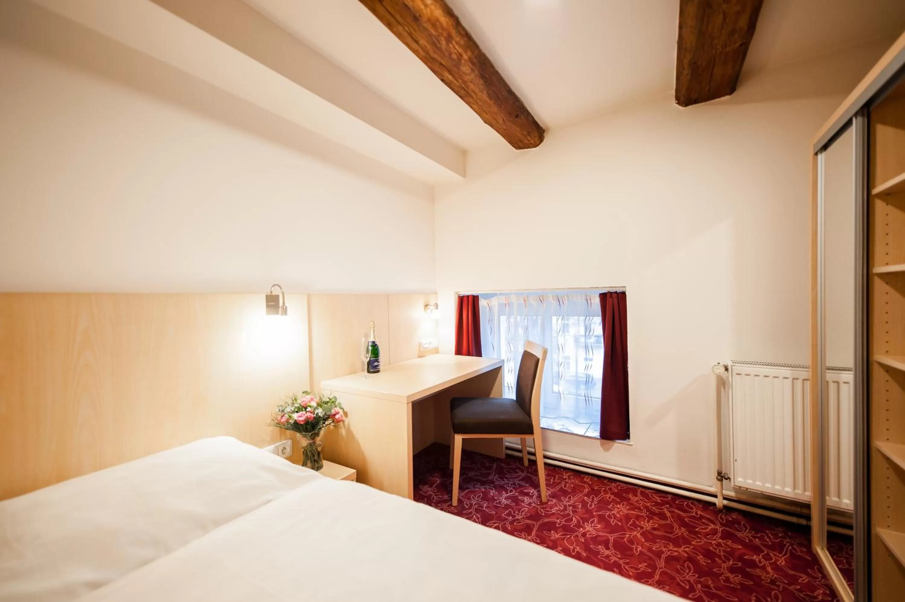 Bed in Hotel Pivovar