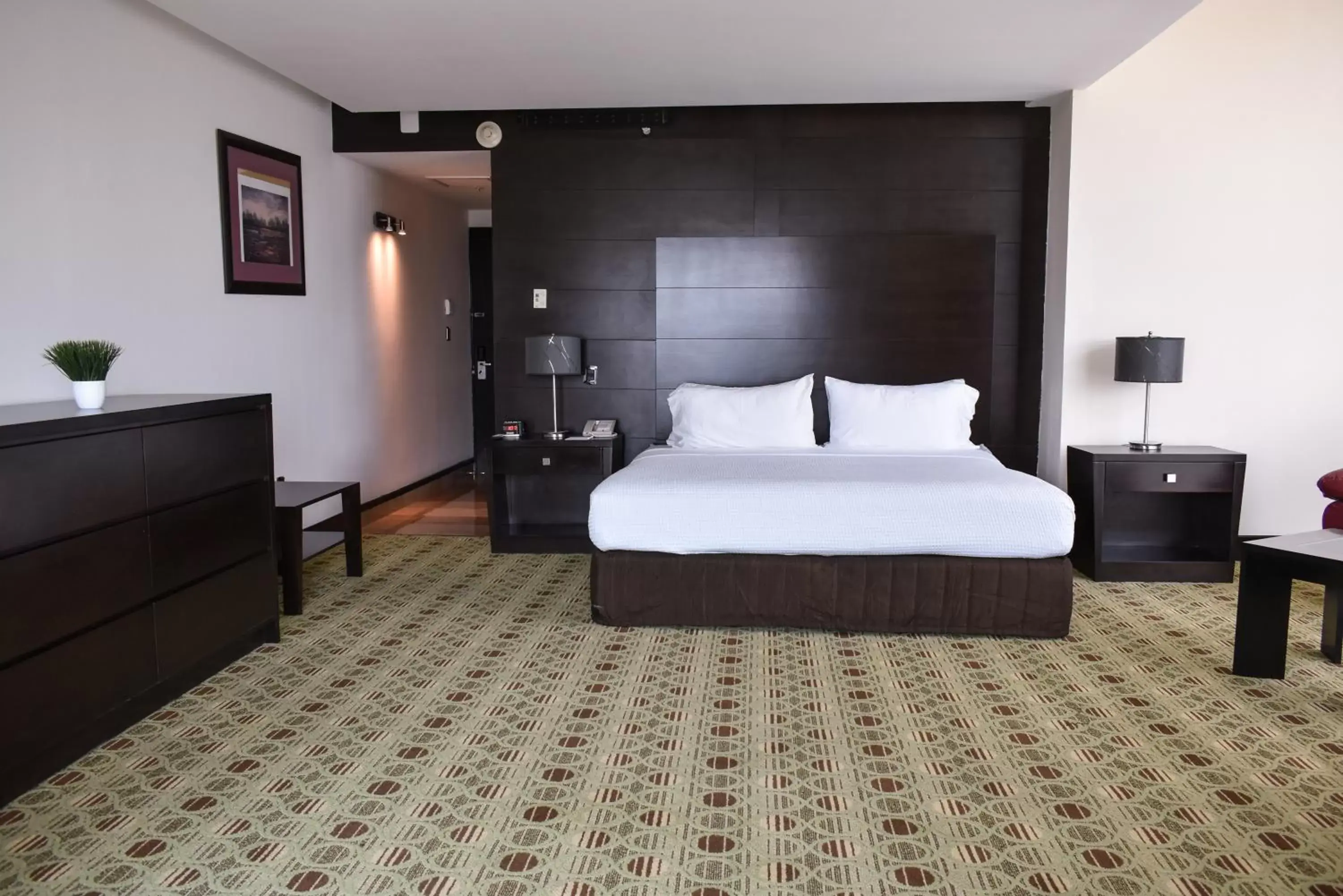 Bed in Hotel Diamante Queretaro