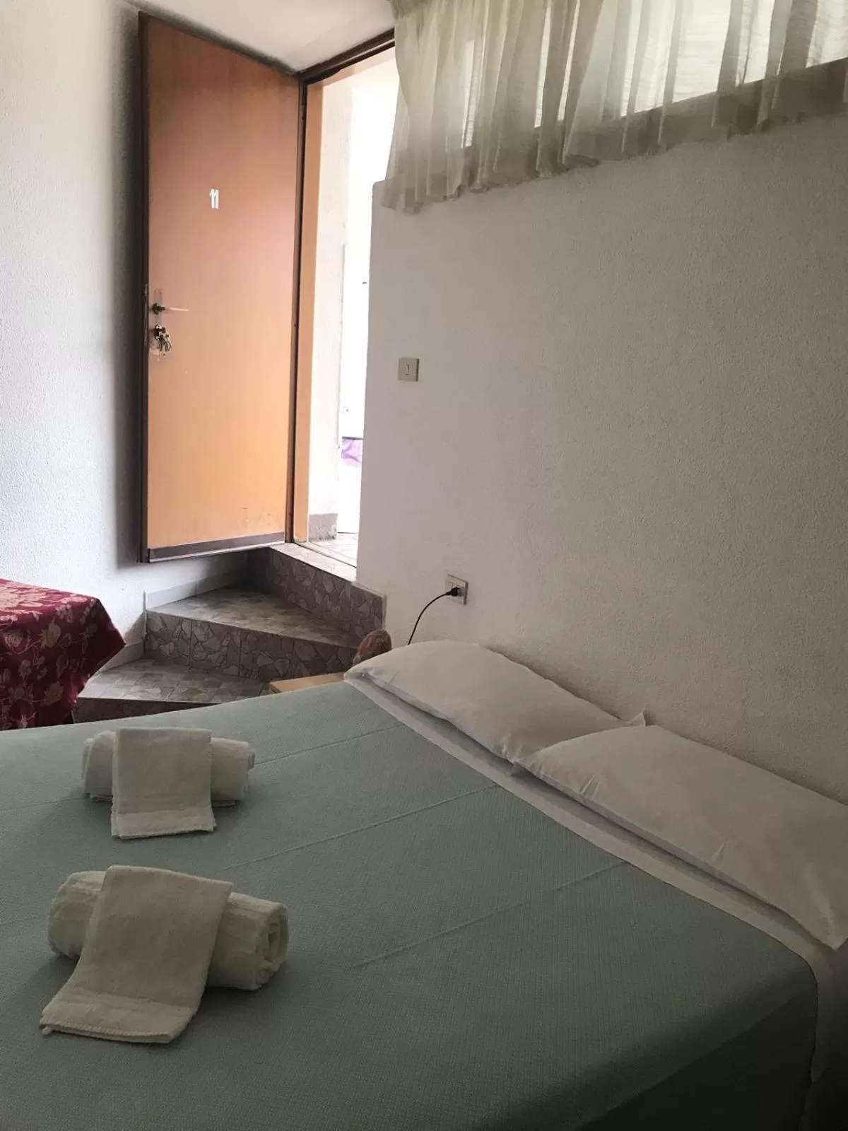 Bed in Hotel Carillon