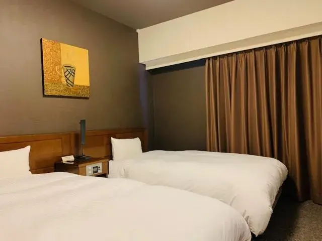 Bed in Hotel Route-Inn Sendaiko Kita Inter