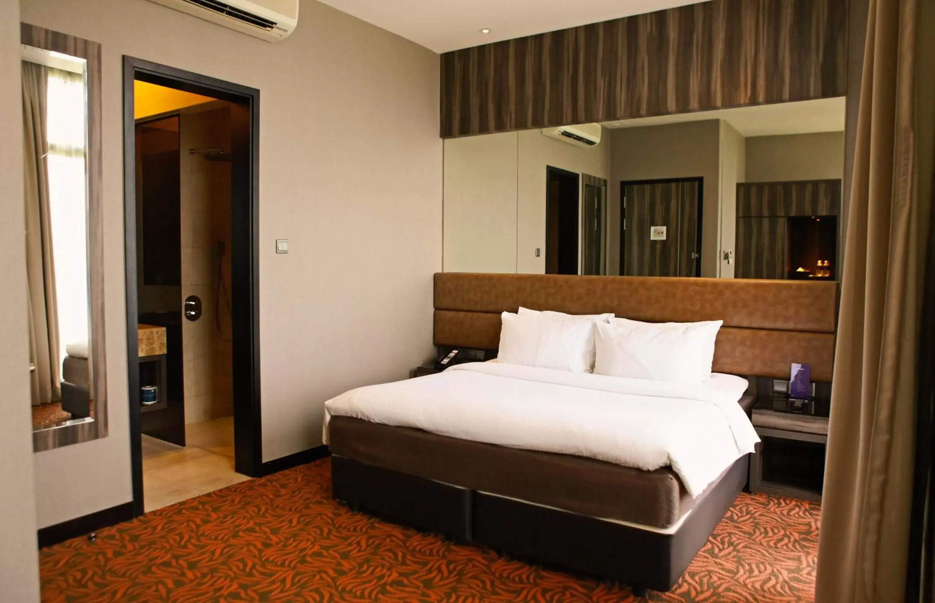 Photo of the whole room, Bed in Aqueen Hotel Paya Lebar