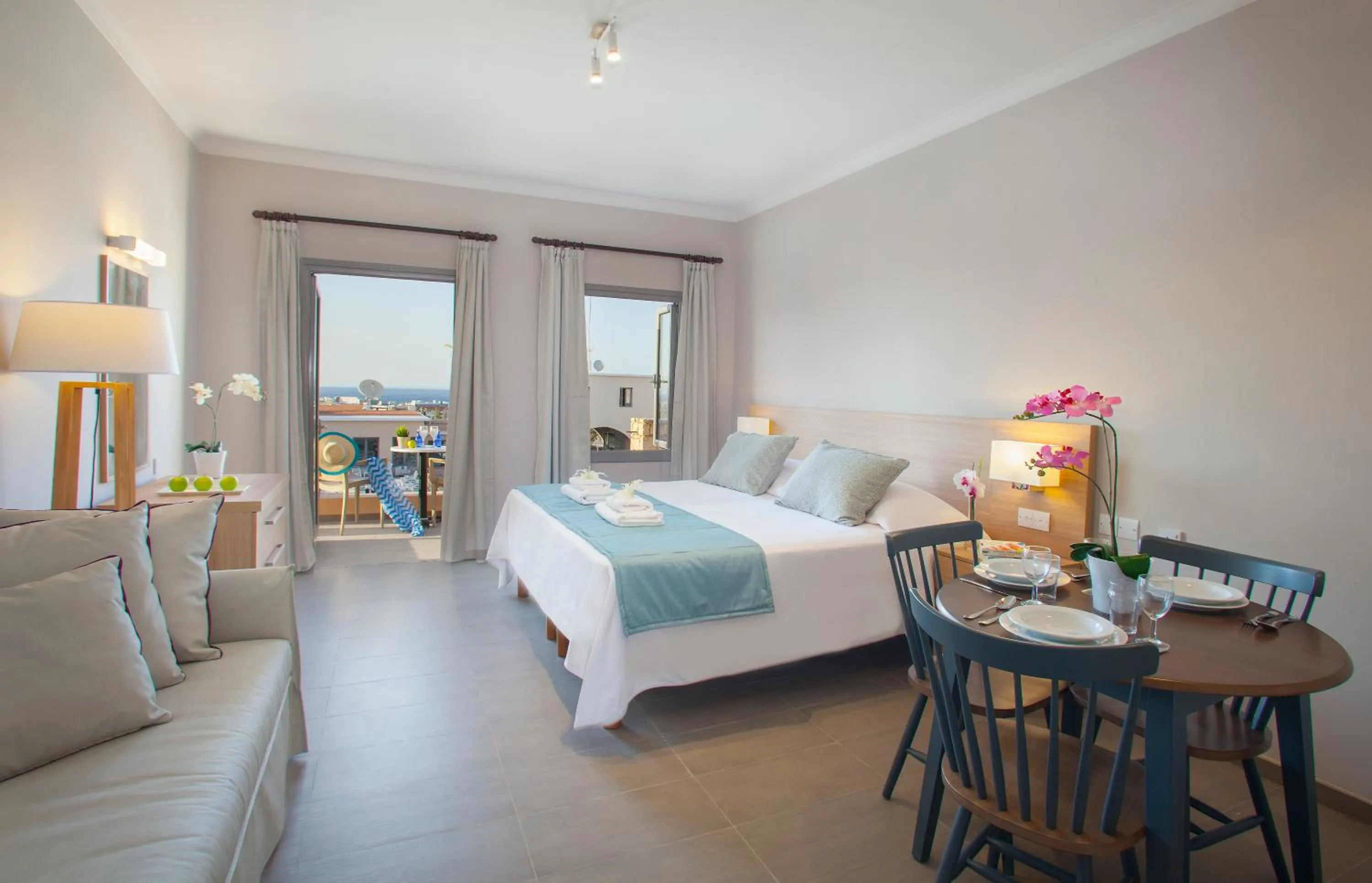 Living room, Bed in Louis St. Elias Resort & Waterpark