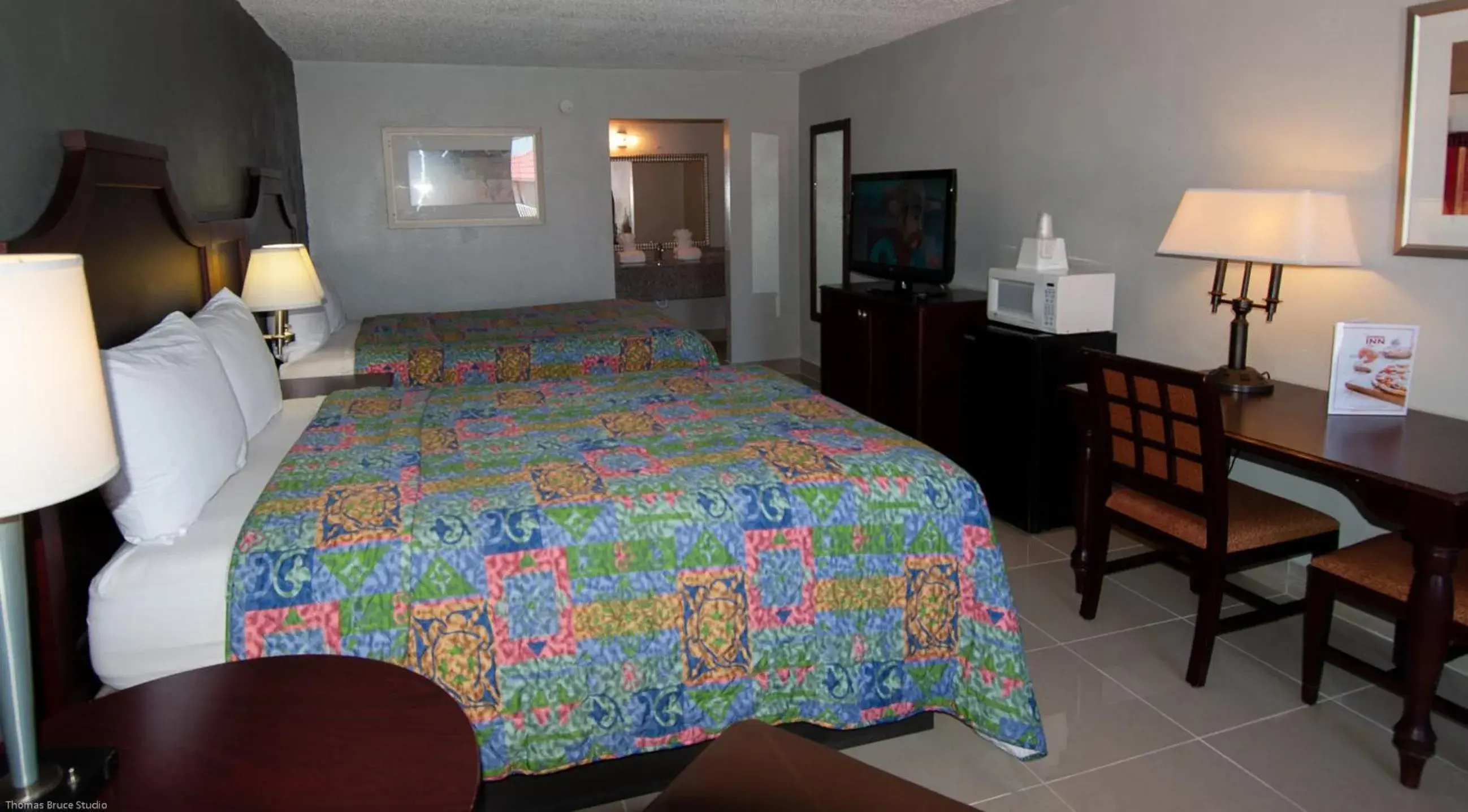 Bed in Express Inn & Suites - 5 Miles from St Petersburg Clearwater Airport