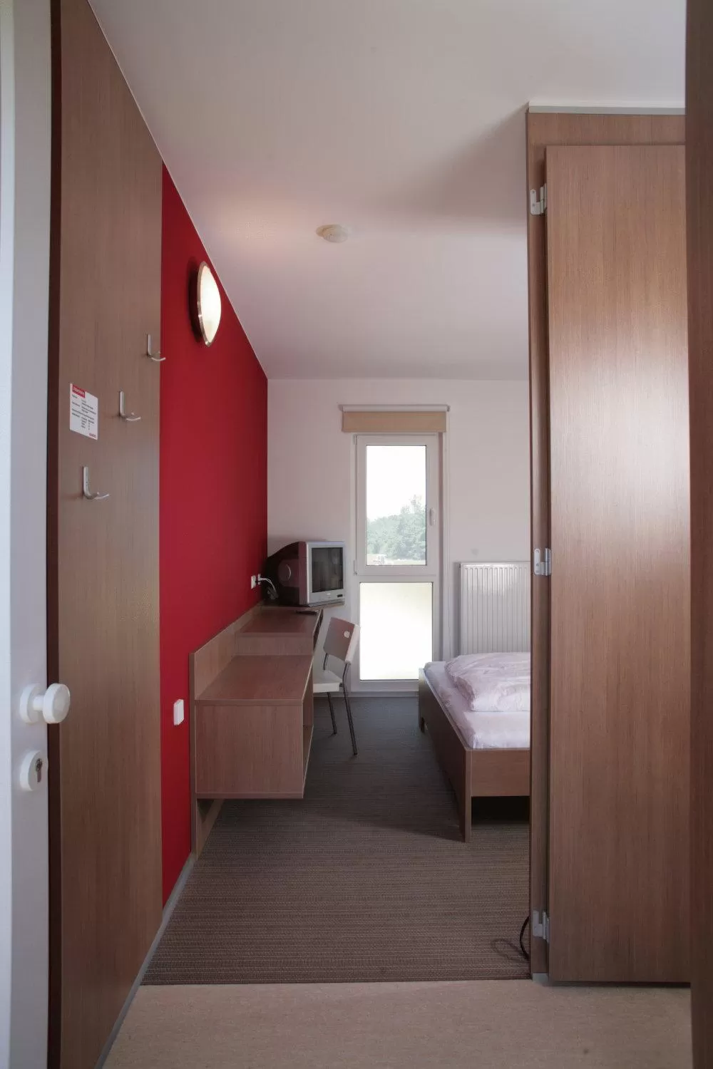 Bed in Nibelungenmotel Pöchlarn