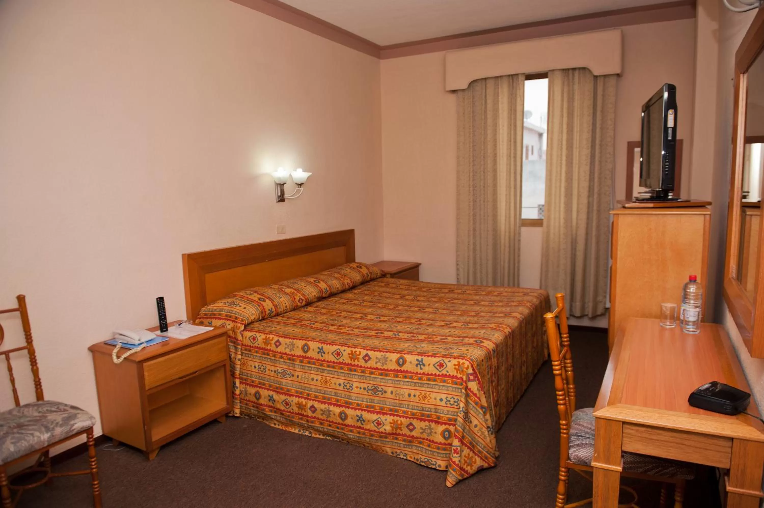 Bed in Hotel Astromundo