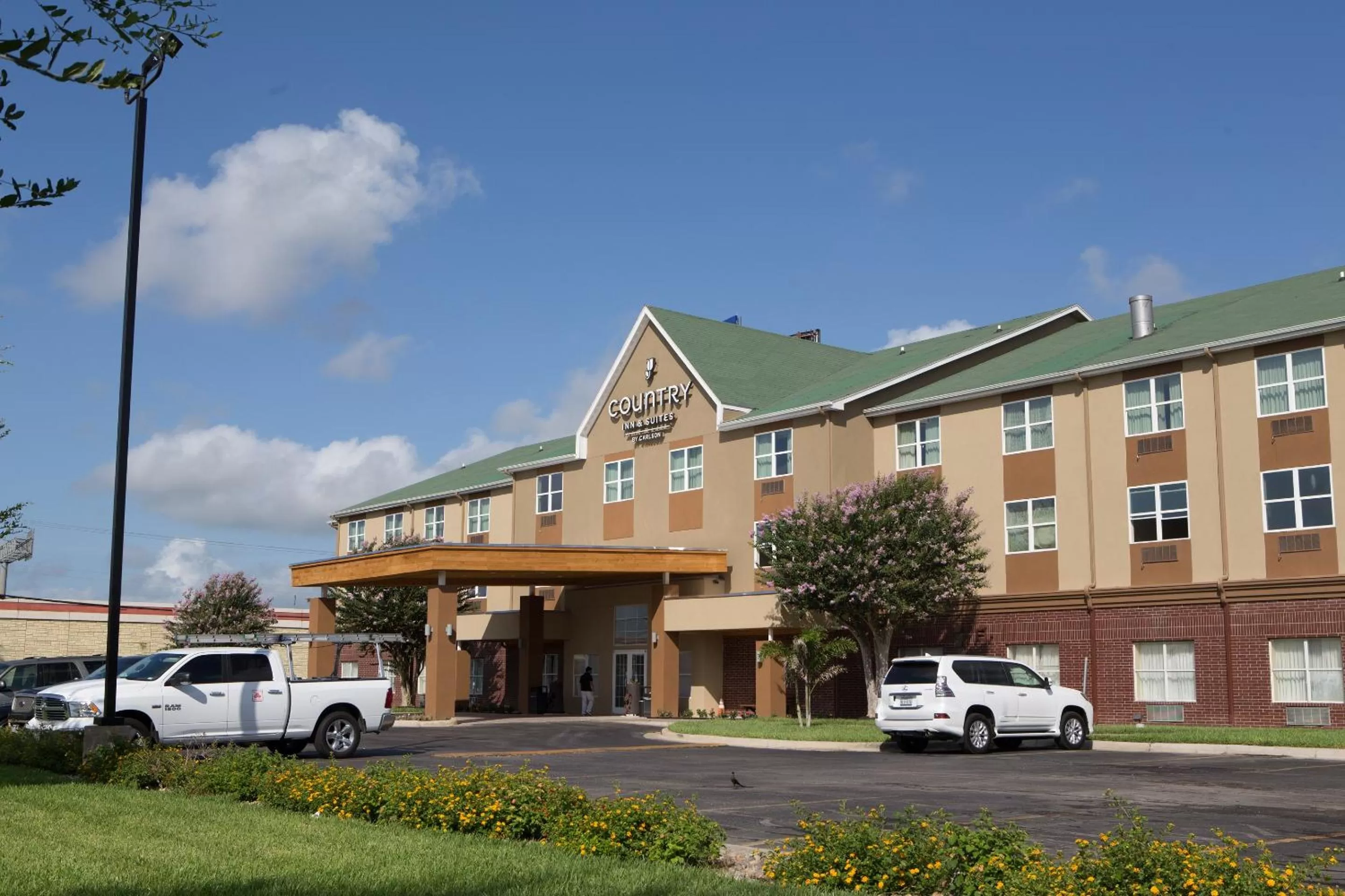 Property building in Country Inn & Suites by Radisson, Harlingen, TX
