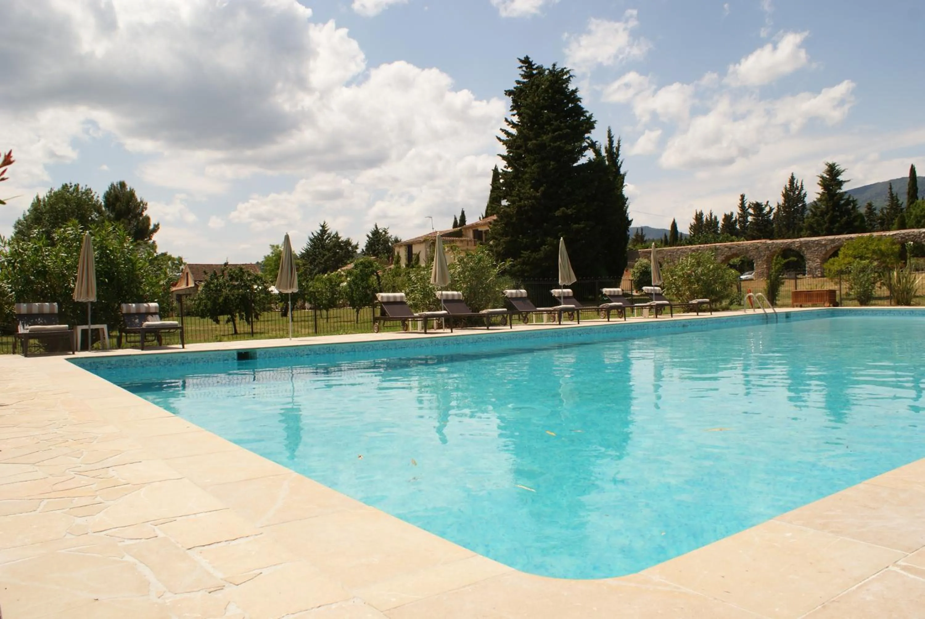 Swimming pool in Hotel-Restaurant Le Moulin De La Camandoule