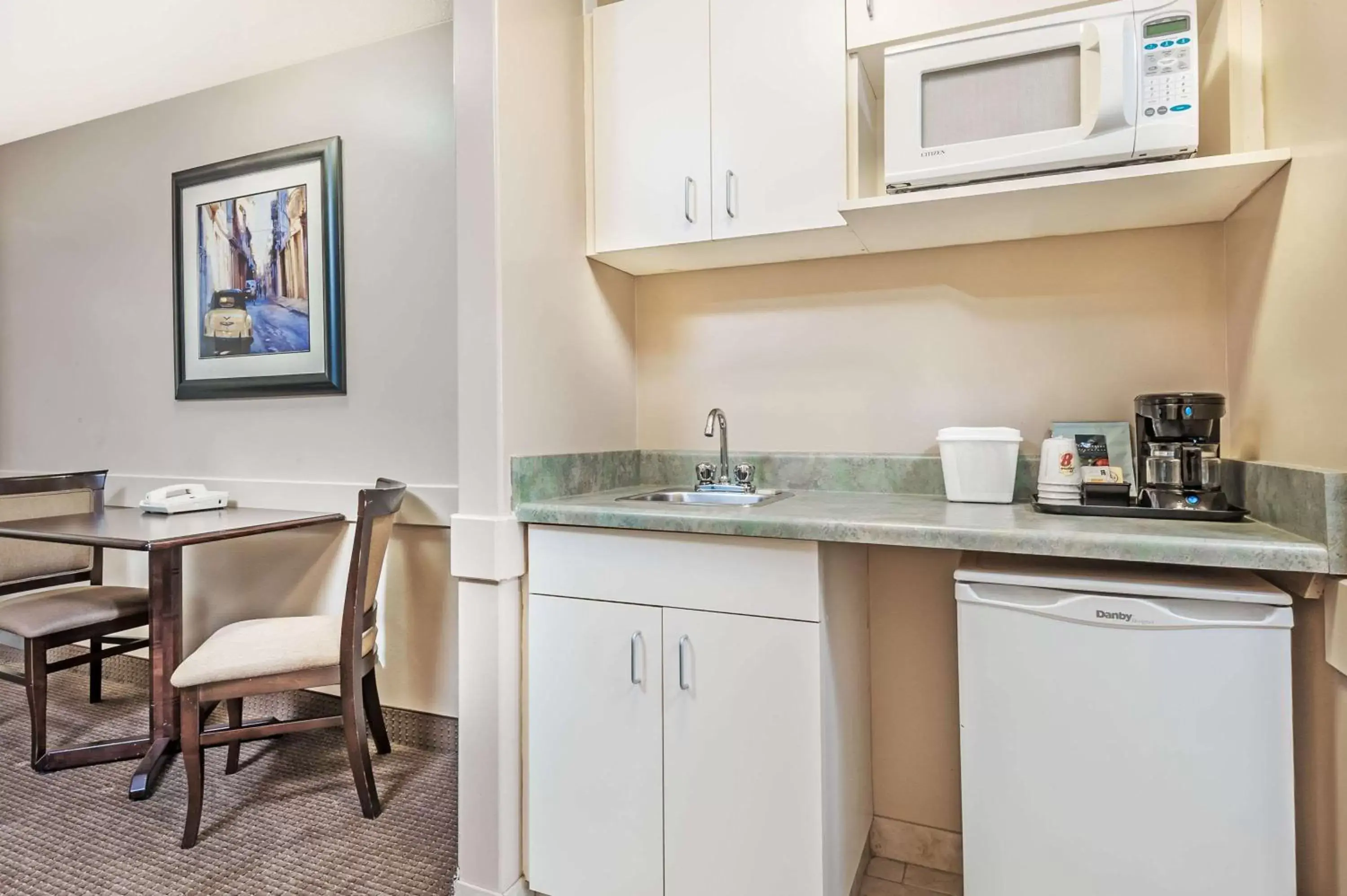 Photo of the whole room, Kitchen/Kitchenette in Super 8 by Wyndham Edmonton South