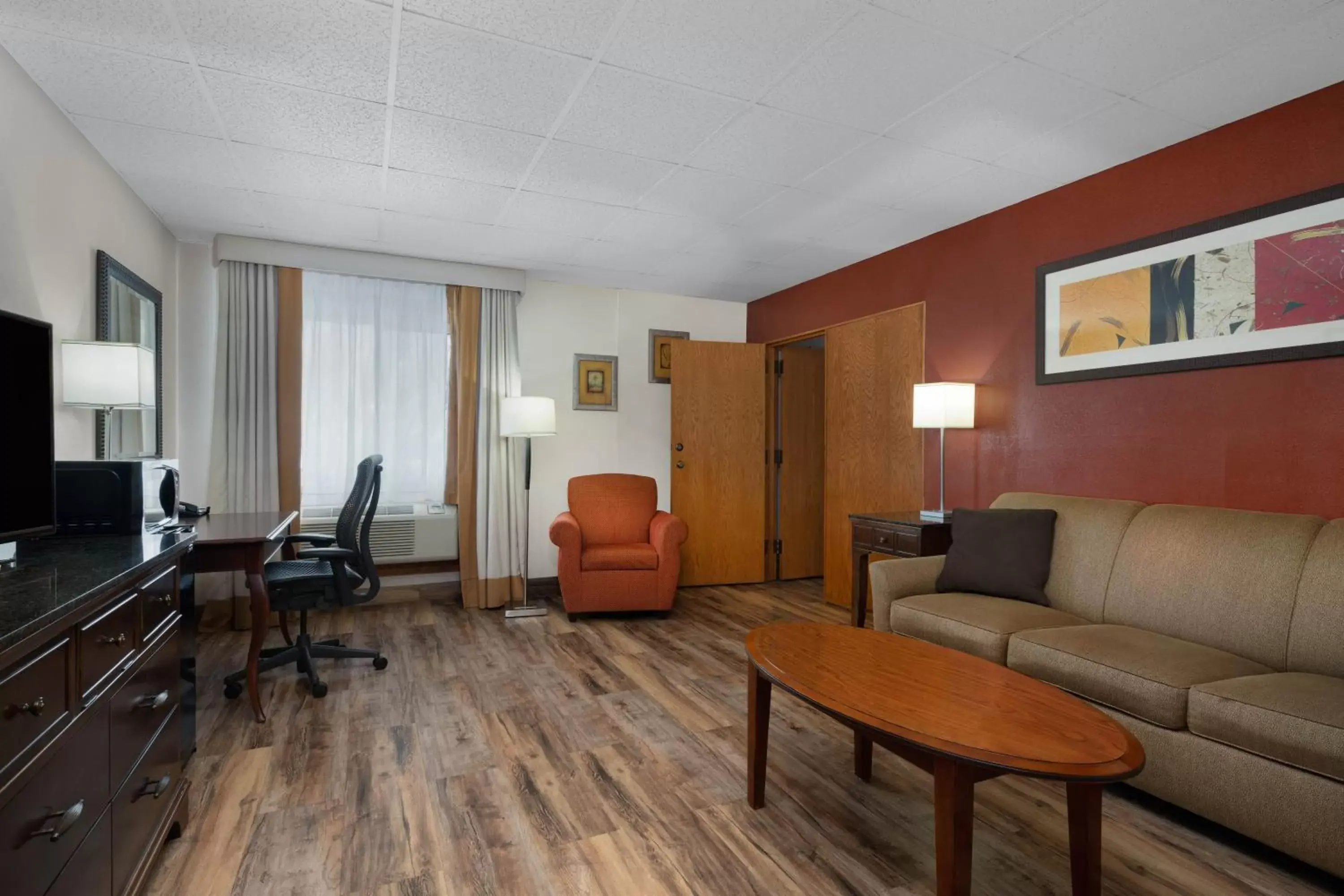 Living room, Seating Area in Ramada by Wyndham Albert Lea