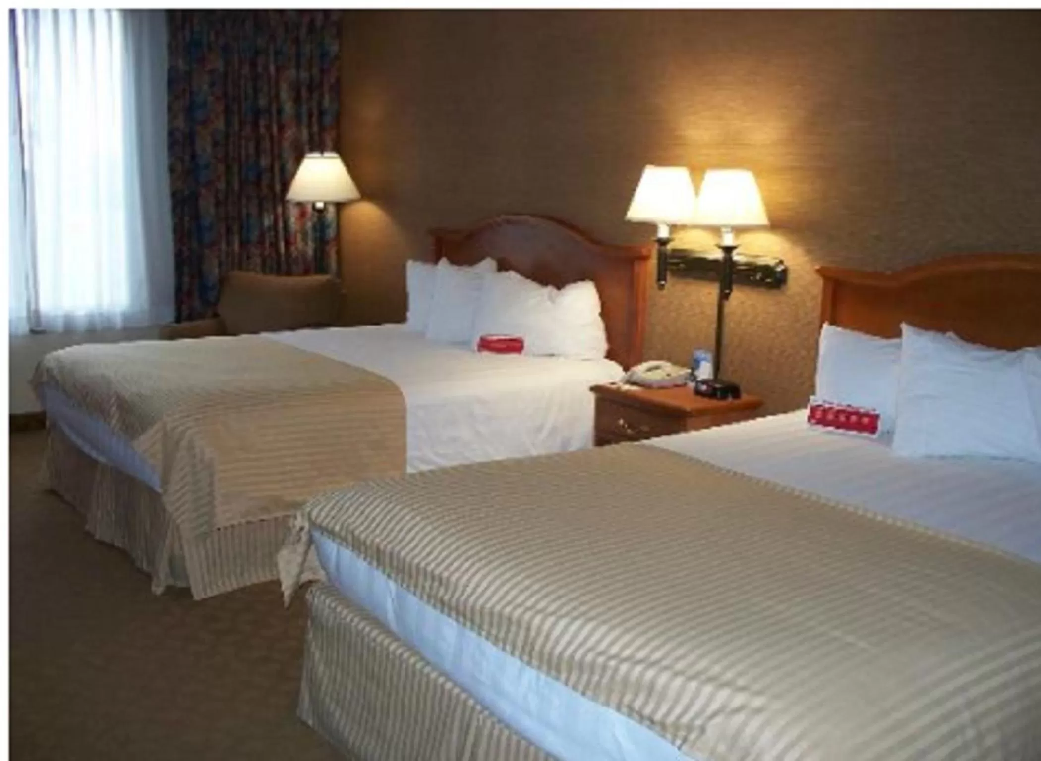 Bed in Ramada by Wyndham Watertown Thousand