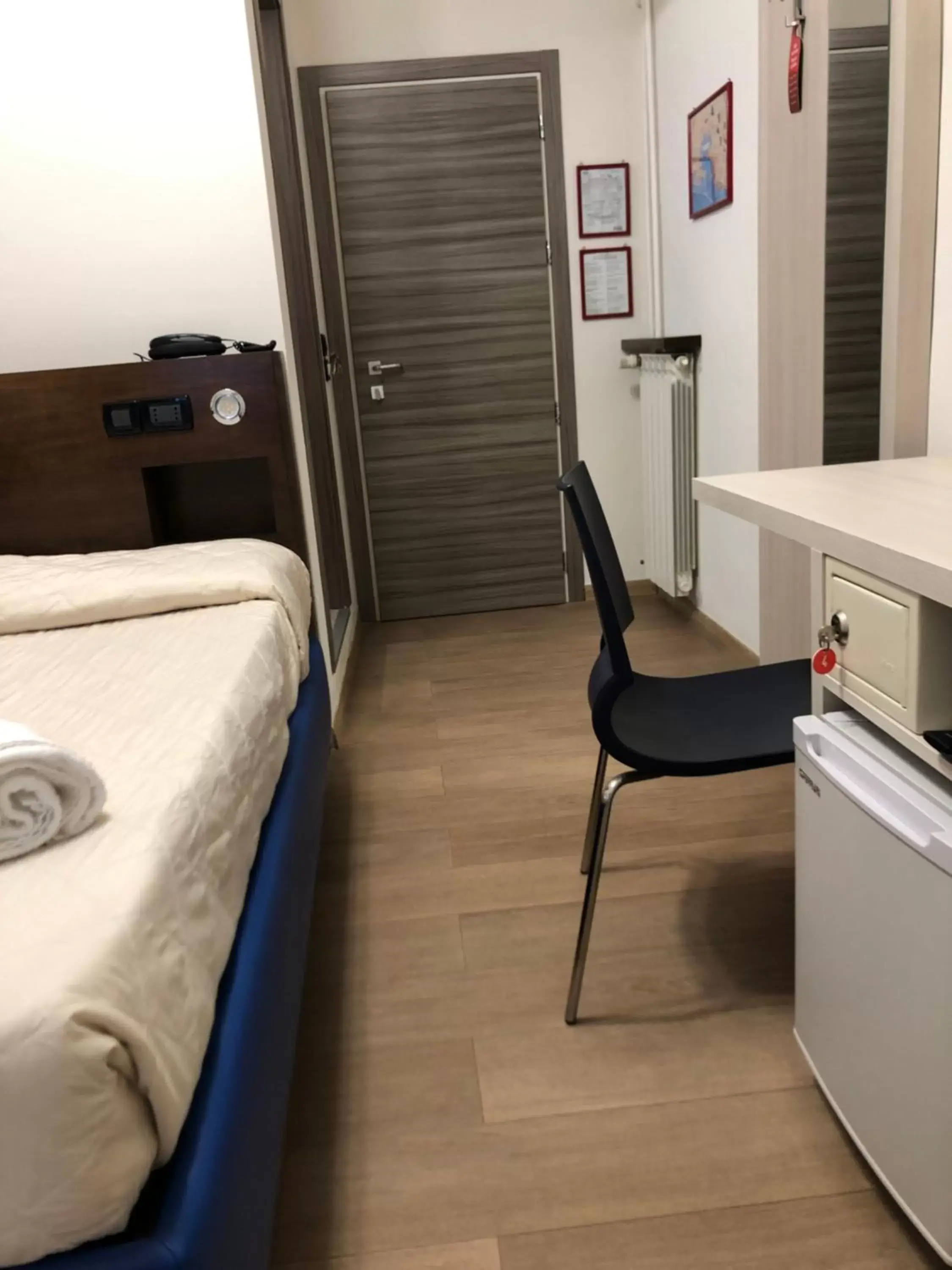 Bed in Hotel Cairoli Bed in Hotel Cairoli